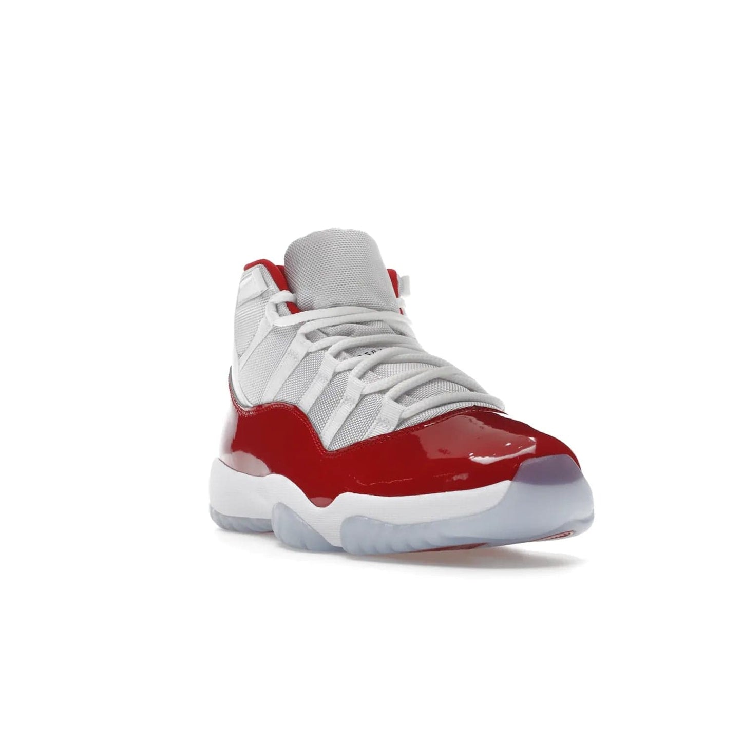 Jordan 11 Retro Cherry (2022) - Image 7 - Only at www.BallersClubKickz.com - The Air Jordan 11 Cherry features classic patent leather with Cherry red accents, icy blue outsole, and debossed 23 on the heel tab. Refresh your sneaker game with this iconic update, available December 10, 2022.