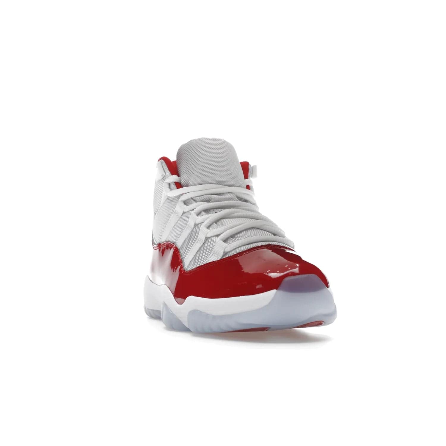 Jordan 11 Retro Cherry (2022) - Image 8 - Only at www.BallersClubKickz.com - The Air Jordan 11 Cherry features classic patent leather with Cherry red accents, icy blue outsole, and debossed 23 on the heel tab. Refresh your sneaker game with this iconic update, available December 10, 2022.