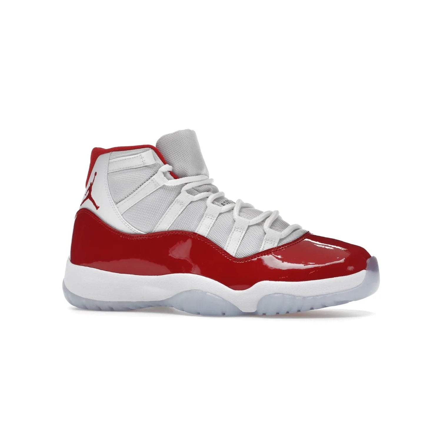 Jordan 11 Retro Cherry (2022) - Image 3 - Only at www.BallersClubKickz.com - The Air Jordan 11 Cherry features classic patent leather with Cherry red accents, icy blue outsole, and debossed 23 on the heel tab. Refresh your sneaker game with this iconic update, available December 10, 2022.