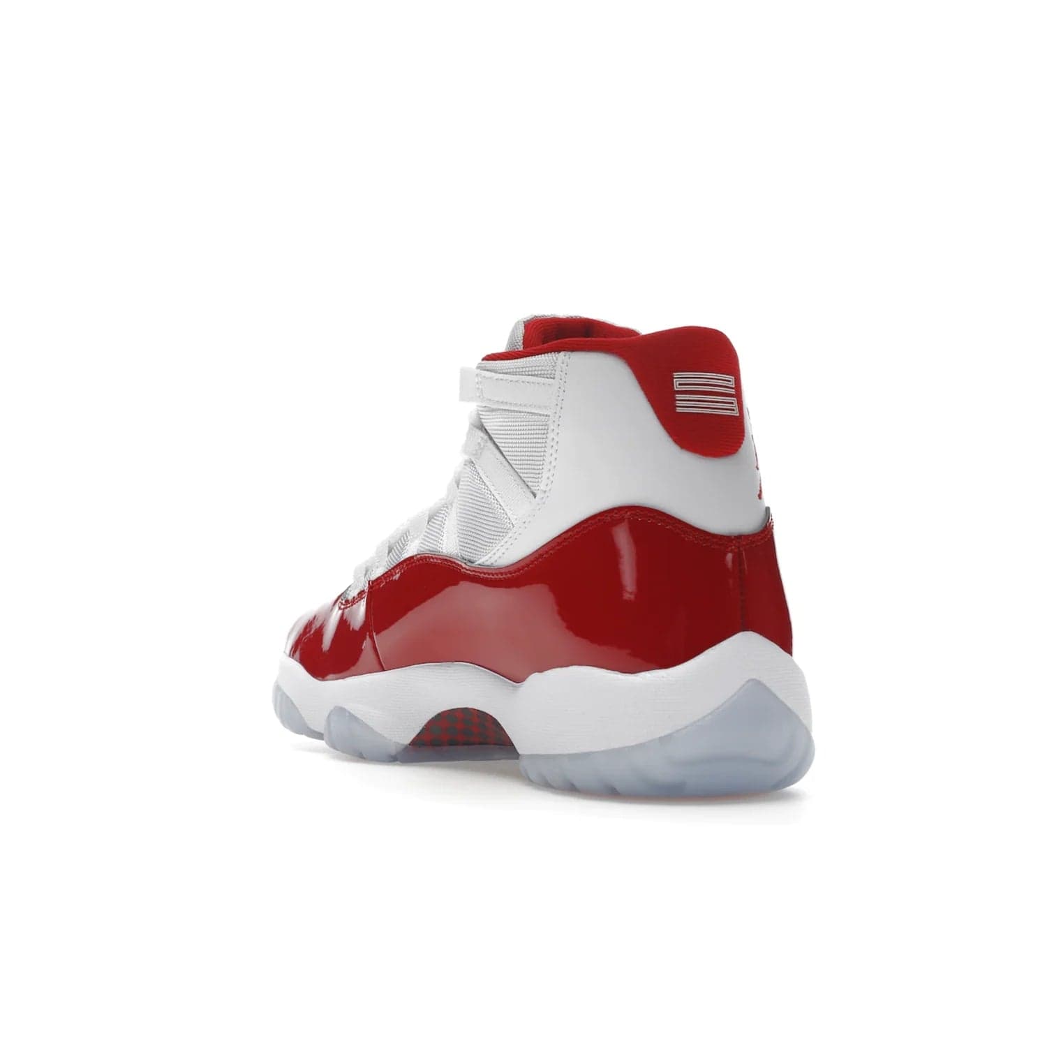 Jordan 11 Retro Cherry (2022) - Image 25 - Only at www.BallersClubKickz.com - The Air Jordan 11 Cherry features classic patent leather with Cherry red accents, icy blue outsole, and debossed 23 on the heel tab. Refresh your sneaker game with this iconic update, available December 10, 2022.