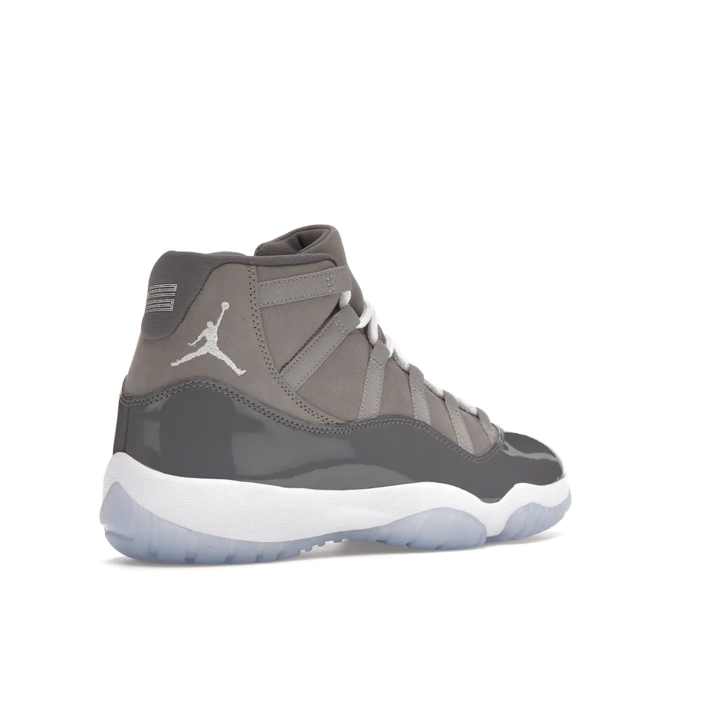 Jordan 11 Retro Cool Grey (2021) - Image 33 - Only at www.BallersClubKickz.com - Shop the Air Jordan 11 Retro Cool Grey (2021) for a must-have sneaker with a Cool Grey Durabuck upper, patent leather overlays, signature Jumpman embroidery, a white midsole, icy blue translucent outsole, and Multi-Color accents.  Released in December 2021 for $225.