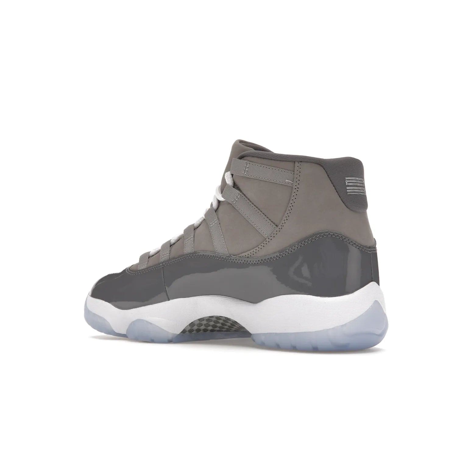 Jordan 11 Retro Cool Grey (2021) - Image 23 - Only at www.BallersClubKickz.com - Shop the Air Jordan 11 Retro Cool Grey (2021) for a must-have sneaker with a Cool Grey Durabuck upper, patent leather overlays, signature Jumpman embroidery, a white midsole, icy blue translucent outsole, and Multi-Color accents.  Released in December 2021 for $225.