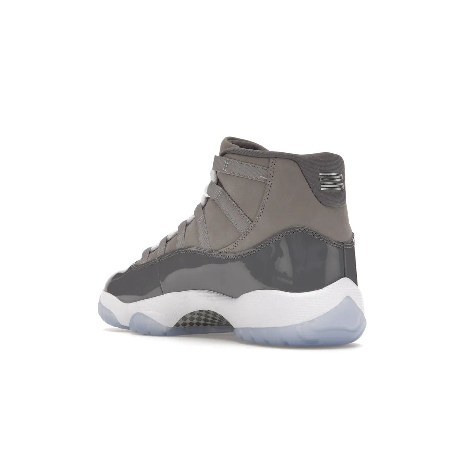 Jordan 11 Retro Cool Grey (2021) - Image 24 - Only at www.BallersClubKickz.com - Shop the Air Jordan 11 Retro Cool Grey (2021) for a must-have sneaker with a Cool Grey Durabuck upper, patent leather overlays, signature Jumpman embroidery, a white midsole, icy blue translucent outsole, and Multi-Color accents.  Released in December 2021 for $225.