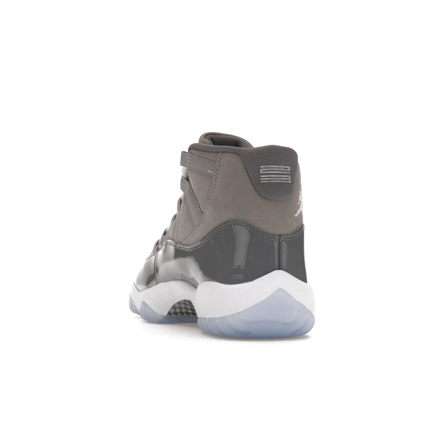 Jordan 11 Retro Cool Grey (2021) - Image 26 - Only at www.BallersClubKickz.com - Shop the Air Jordan 11 Retro Cool Grey (2021) for a must-have sneaker with a Cool Grey Durabuck upper, patent leather overlays, signature Jumpman embroidery, a white midsole, icy blue translucent outsole, and Multi-Color accents.  Released in December 2021 for $225.
