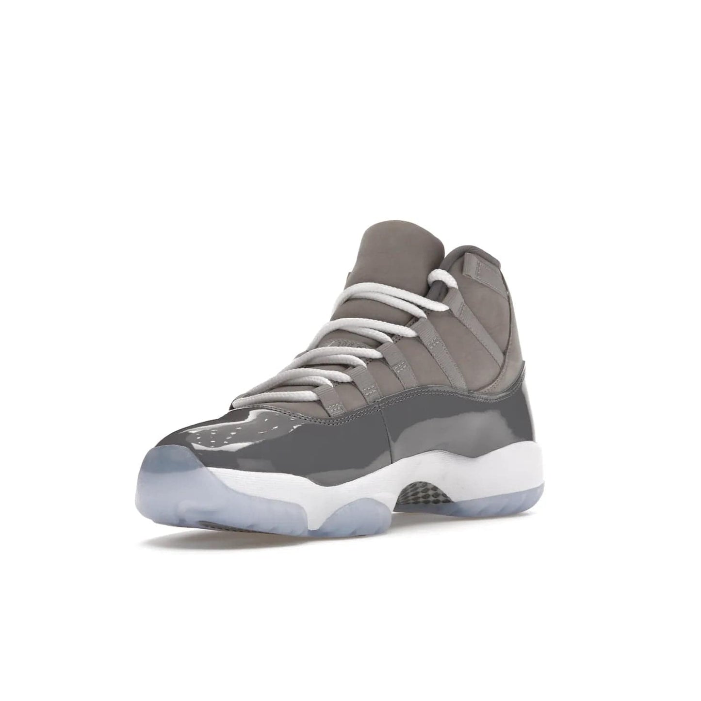Jordan 11 Retro Cool Grey (2021) - Image 14 - Only at www.BallersClubKickz.com - Shop the Air Jordan 11 Retro Cool Grey (2021) for a must-have sneaker with a Cool Grey Durabuck upper, patent leather overlays, signature Jumpman embroidery, a white midsole, icy blue translucent outsole, and Multi-Color accents.  Released in December 2021 for $225.
