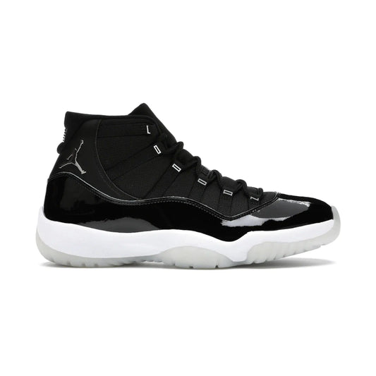 Jordan 11 Retro Jubilee 25th Anniversary - Image 1 - Only at www.BallersClubKickz.com - Celebrate 25 years of iconic style and performance with the Jordan 11 Retro Jubilee 25th Anniversary. Re-released by Nike and Michael Jordan in 2020 to commemorate the legendary Tinker Hatfield design, this shoe features a luxurious black leather upper, white midsole, and foggy translucent outsole. Carbon fiber plating ensures superior power and stability. Add this masterpiece to your collection today.