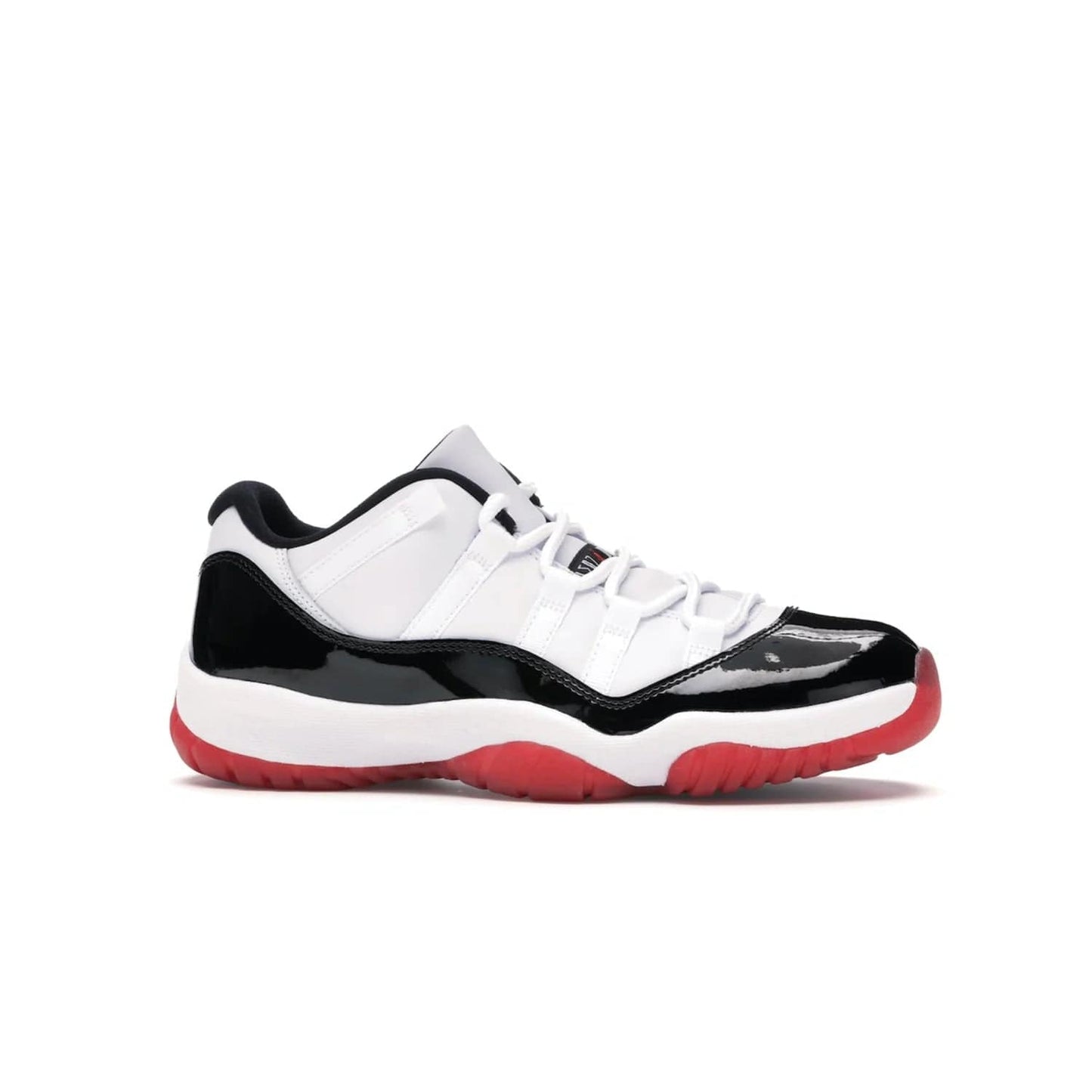Jordan 11 Retro Low Concord Bred - Image 2 - Only at www.BallersClubKickz.com - Grab the classic Jordan 11 look with the Jordan 11 Retro Low Concord Bred. With white and black elements and the iconic red outsole of the Jordan 11 Bred, you won't miss a beat. Released in June 2020, the perfect complement to any outfit.