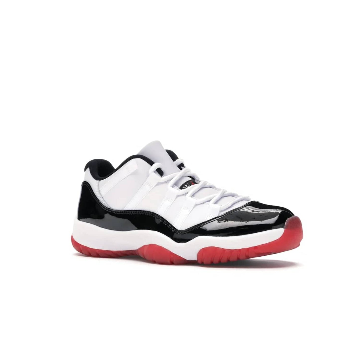 Jordan 11 Retro Low Concord Bred - Image 4 - Only at www.BallersClubKickz.com - Grab the classic Jordan 11 look with the Jordan 11 Retro Low Concord Bred. With white and black elements and the iconic red outsole of the Jordan 11 Bred, you won't miss a beat. Released in June 2020, the perfect complement to any outfit.
