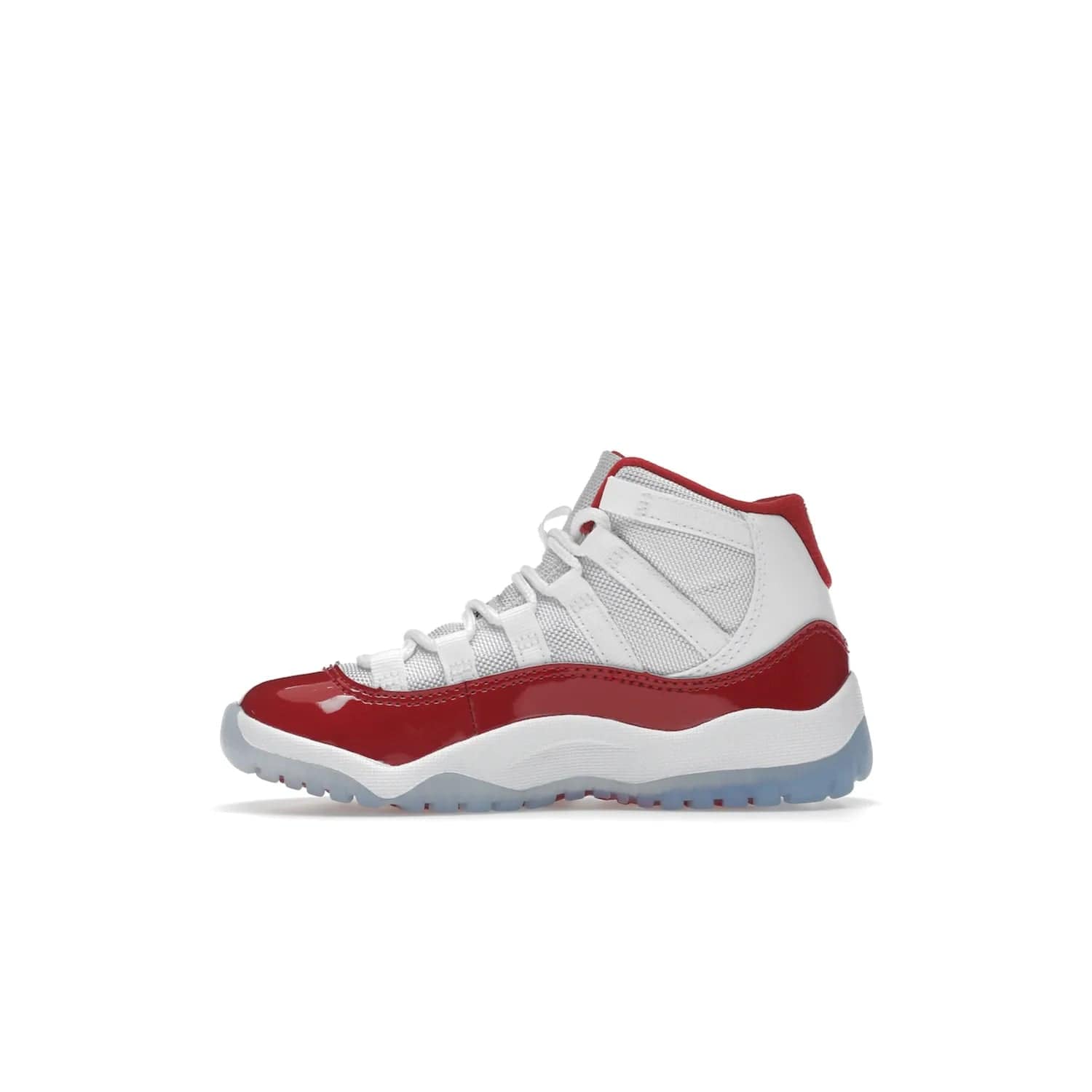 Jordan 11 Retro Cherry (2022) (PS) - Image 19 - Only at www.BallersClubKickz.com - An iconic silhouette with a timeless look, the Air Jordan 11 Retro Cherry 2022 PS features a crisp White, Varsity Red and Black colorway. The upper is made of ballistic mesh, a red patent leather mudguard, '23' branding and white Phylon midsole. Get optimal cushioning and comfort on December 10th, 2022. Don't miss out.