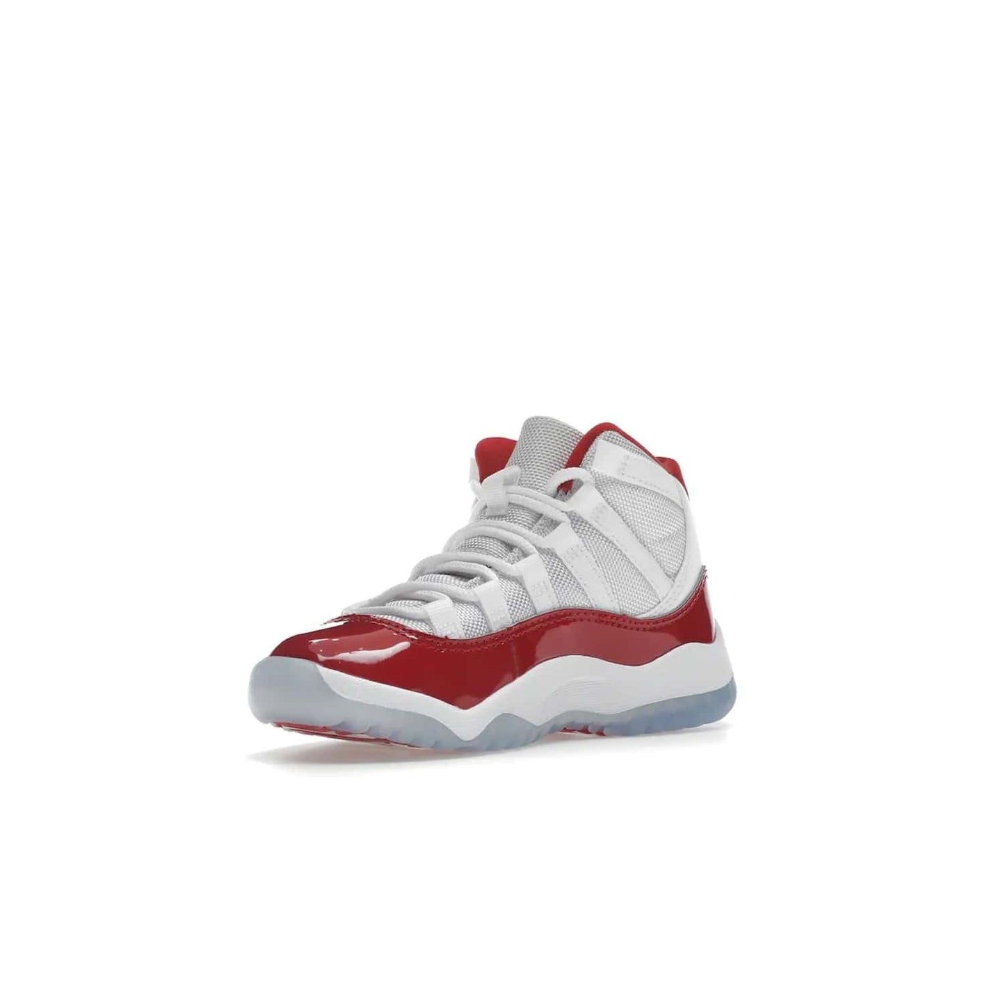 Jordan 11 Retro Cherry (2022) (PS) - Image 15 - Only at www.BallersClubKickz.com - An iconic silhouette with a timeless look, the Air Jordan 11 Retro Cherry 2022 PS features a crisp White, Varsity Red and Black colorway. The upper is made of ballistic mesh, a red patent leather mudguard, '23' branding and white Phylon midsole. Get optimal cushioning and comfort on December 10th, 2022. Don't miss out.