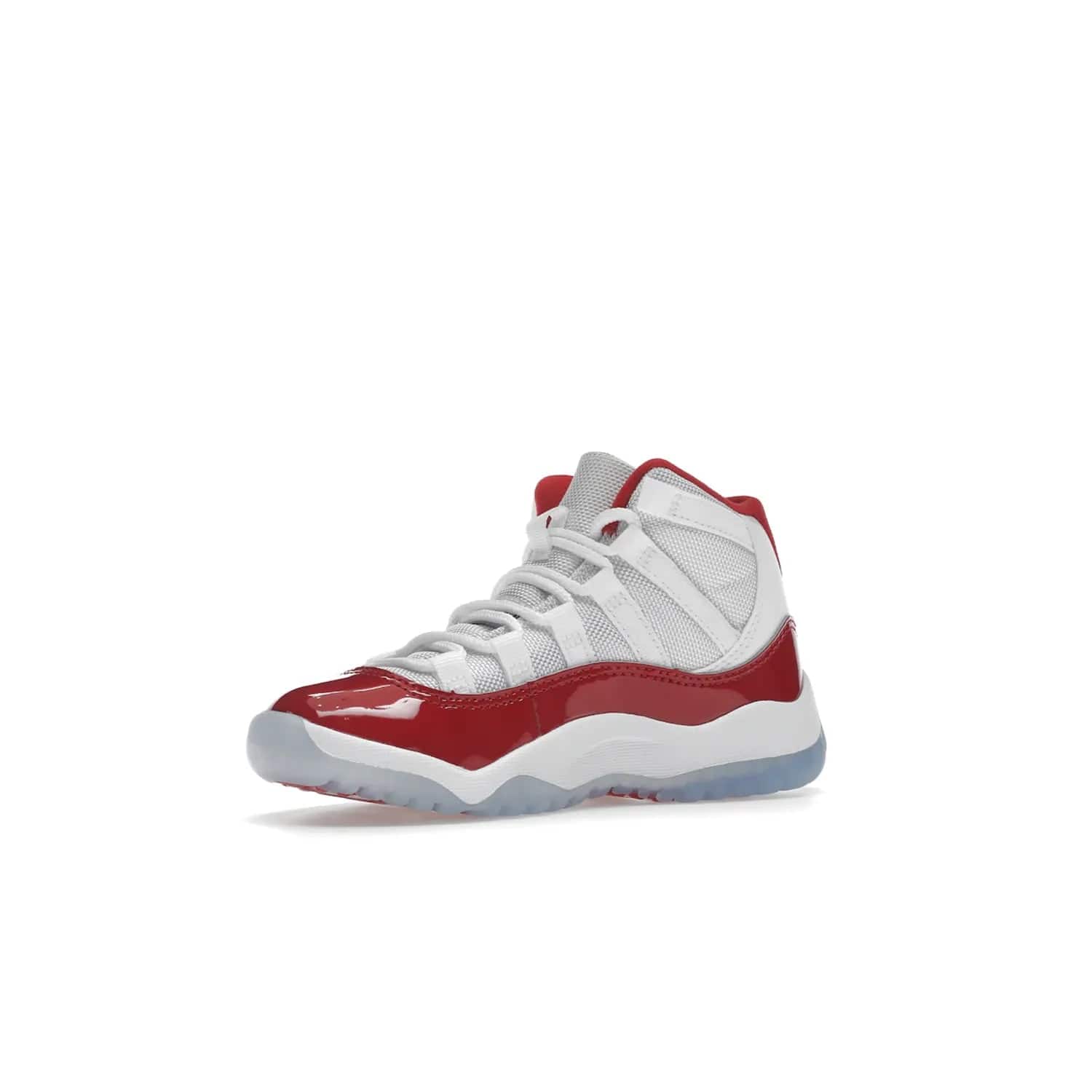 Jordan 11 Retro Cherry (2022) (PS) - Image 16 - Only at www.BallersClubKickz.com - An iconic silhouette with a timeless look, the Air Jordan 11 Retro Cherry 2022 PS features a crisp White, Varsity Red and Black colorway. The upper is made of ballistic mesh, a red patent leather mudguard, '23' branding and white Phylon midsole. Get optimal cushioning and comfort on December 10th, 2022. Don't miss out.
