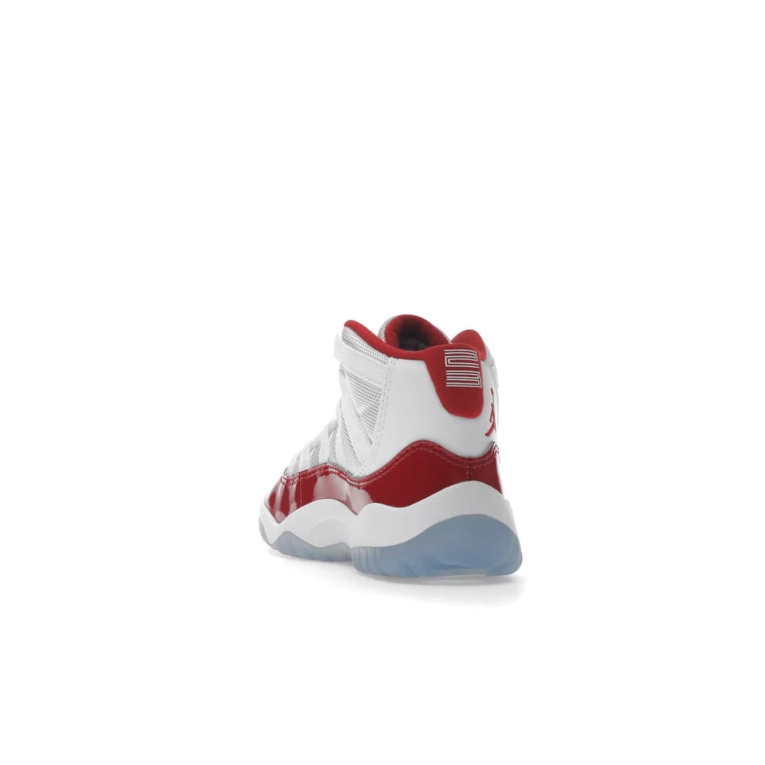 Jordan 11 Retro Cherry (2022) (PS) - Image 26 - Only at www.BallersClubKickz.com - An iconic silhouette with a timeless look, the Air Jordan 11 Retro Cherry 2022 PS features a crisp White, Varsity Red and Black colorway. The upper is made of ballistic mesh, a red patent leather mudguard, '23' branding and white Phylon midsole. Get optimal cushioning and comfort on December 10th, 2022. Don't miss out.