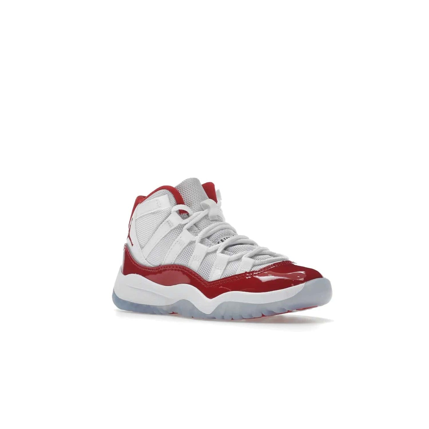 Jordan 11 Retro Cherry (2022) (PS) - Image 5 - Only at www.BallersClubKickz.com - An iconic silhouette with a timeless look, the Air Jordan 11 Retro Cherry 2022 PS features a crisp White, Varsity Red and Black colorway. The upper is made of ballistic mesh, a red patent leather mudguard, '23' branding and white Phylon midsole. Get optimal cushioning and comfort on December 10th, 2022. Don't miss out.