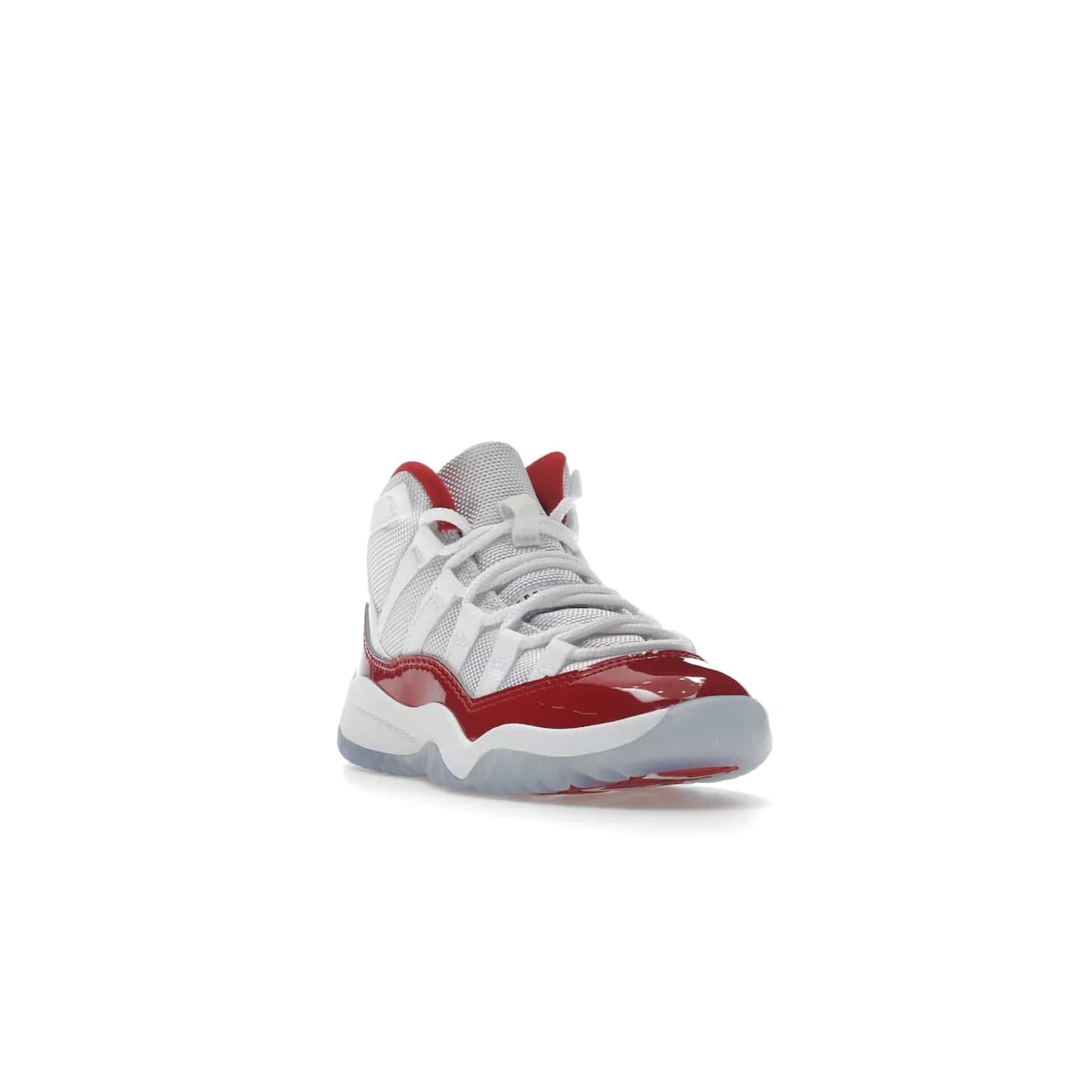 Jordan 11 Retro Cherry (2022) (PS) - Image 7 - Only at www.BallersClubKickz.com - An iconic silhouette with a timeless look, the Air Jordan 11 Retro Cherry 2022 PS features a crisp White, Varsity Red and Black colorway. The upper is made of ballistic mesh, a red patent leather mudguard, '23' branding and white Phylon midsole. Get optimal cushioning and comfort on December 10th, 2022. Don't miss out.