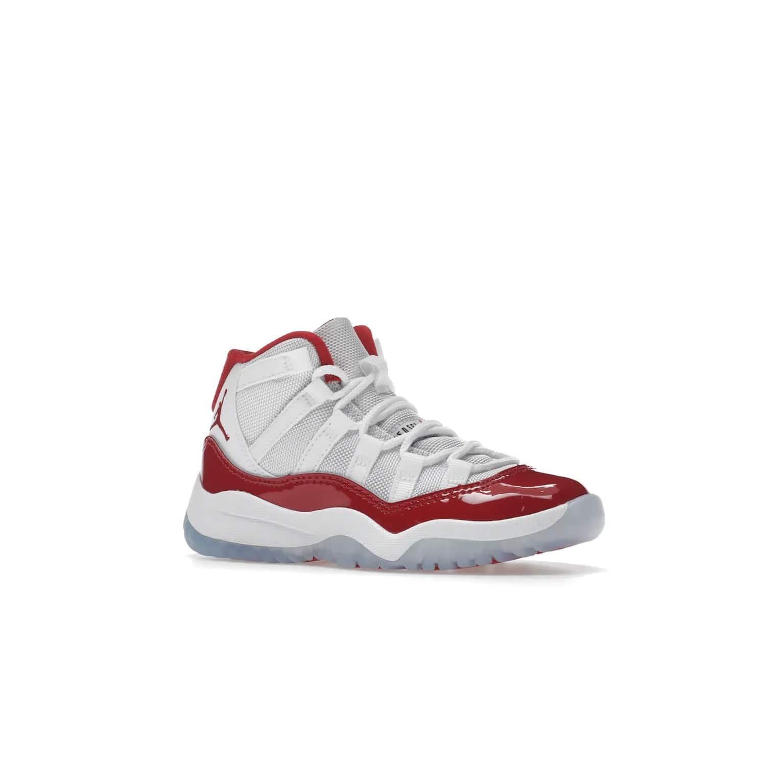Jordan 11 Retro Cherry (2022) (PS) - Image 4 - Only at www.BallersClubKickz.com - An iconic silhouette with a timeless look, the Air Jordan 11 Retro Cherry 2022 PS features a crisp White, Varsity Red and Black colorway. The upper is made of ballistic mesh, a red patent leather mudguard, '23' branding and white Phylon midsole. Get optimal cushioning and comfort on December 10th, 2022. Don't miss out.