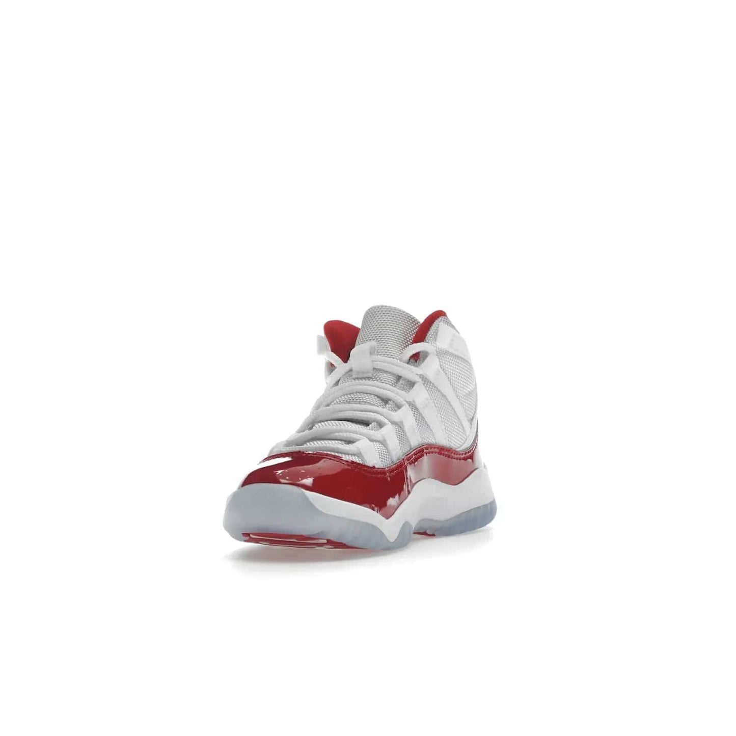 Jordan 11 Retro Cherry (2022) (PS) - Image 13 - Only at www.BallersClubKickz.com - An iconic silhouette with a timeless look, the Air Jordan 11 Retro Cherry 2022 PS features a crisp White, Varsity Red and Black colorway. The upper is made of ballistic mesh, a red patent leather mudguard, '23' branding and white Phylon midsole. Get optimal cushioning and comfort on December 10th, 2022. Don't miss out.