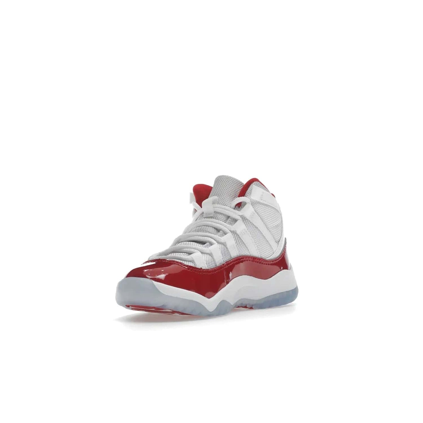 Jordan 11 Retro Cherry (2022) (PS) - Image 14 - Only at www.BallersClubKickz.com - An iconic silhouette with a timeless look, the Air Jordan 11 Retro Cherry 2022 PS features a crisp White, Varsity Red and Black colorway. The upper is made of ballistic mesh, a red patent leather mudguard, '23' branding and white Phylon midsole. Get optimal cushioning and comfort on December 10th, 2022. Don't miss out.