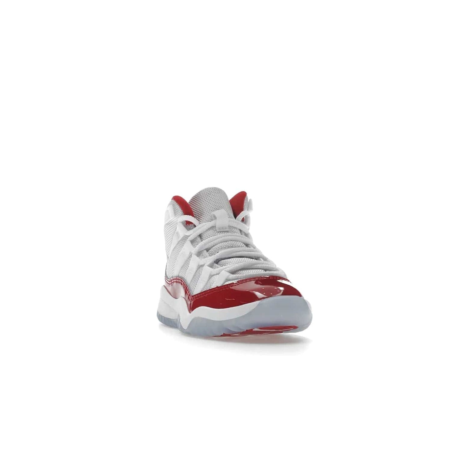Jordan 11 Retro Cherry (2022) (PS) - Image 8 - Only at www.BallersClubKickz.com - An iconic silhouette with a timeless look, the Air Jordan 11 Retro Cherry 2022 PS features a crisp White, Varsity Red and Black colorway. The upper is made of ballistic mesh, a red patent leather mudguard, '23' branding and white Phylon midsole. Get optimal cushioning and comfort on December 10th, 2022. Don't miss out.