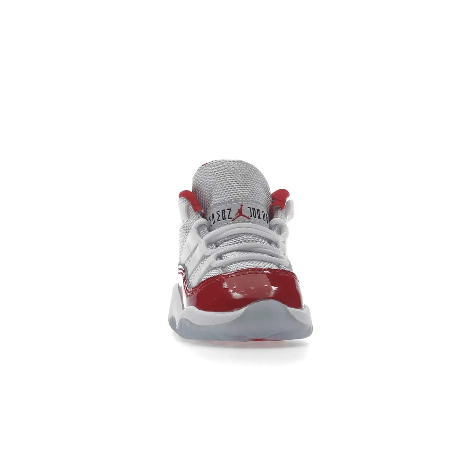 Jordan 11 Retro Cherry (2022) (TD) - Image 9 - Only at www.BallersClubKickz.com - Timeless classic. Air Jordan 11 Retro Cherry 2022 TD combines mesh, leather & suede for a unique look. White upper with varsity red suede. Jumpman logo on collar & tongue. Available Dec 10th, priced at $80.