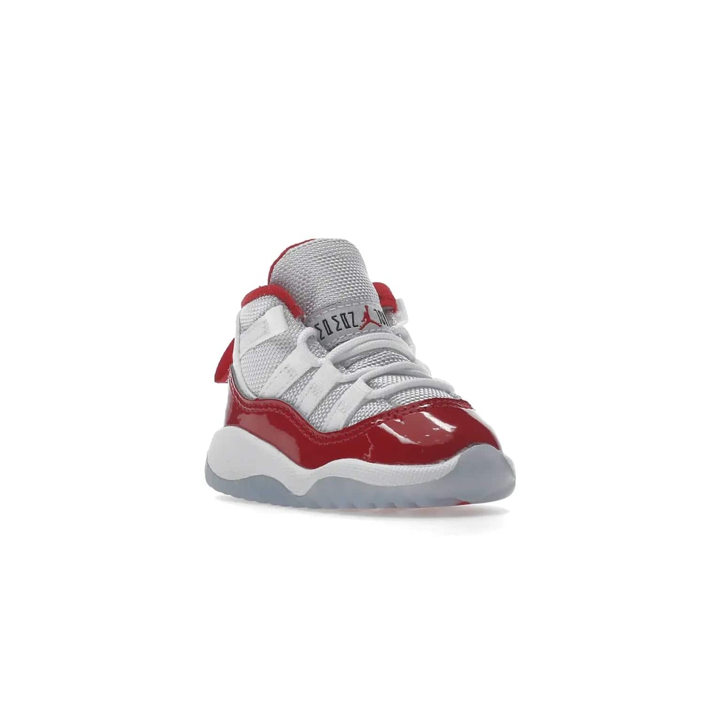 Jordan 11 Retro Cherry (2022) (TD) - Image 6 - Only at www.BallersClubKickz.com - Timeless classic. Air Jordan 11 Retro Cherry 2022 TD combines mesh, leather & suede for a unique look. White upper with varsity red suede. Jumpman logo on collar & tongue. Available Dec 10th, priced at $80.