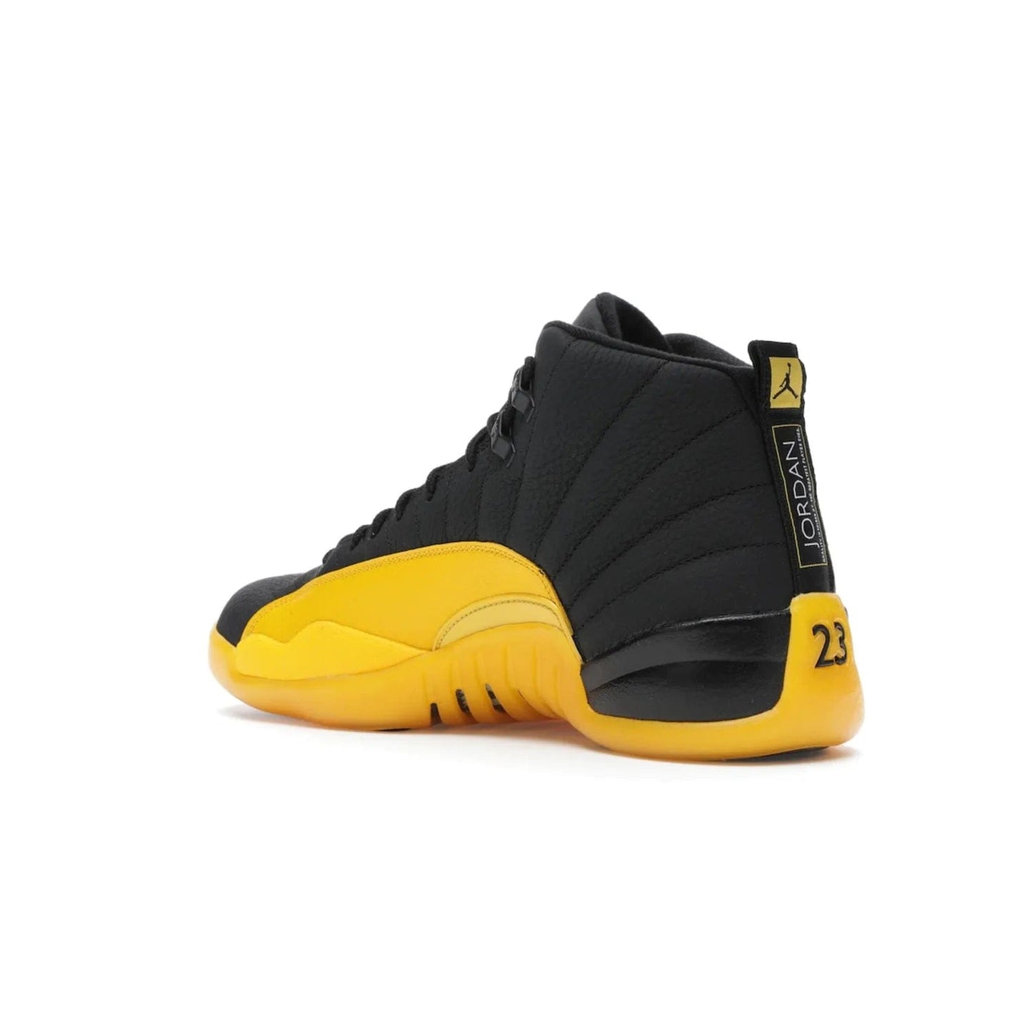 Jordan 12 Retro Black University Gold - Image 23 - Only at www.BallersClubKickz.com - This Jordan 12 Retro features a black tumbled leather upper and University Gold accents for a modern twist. Boasting Jordan "Two Three" branding and a yellow sole, these shoes will elevate your wardrobe. Fresh, sleek, and one of a kind - the Jordan 12 University Gold is your summer sneaker.