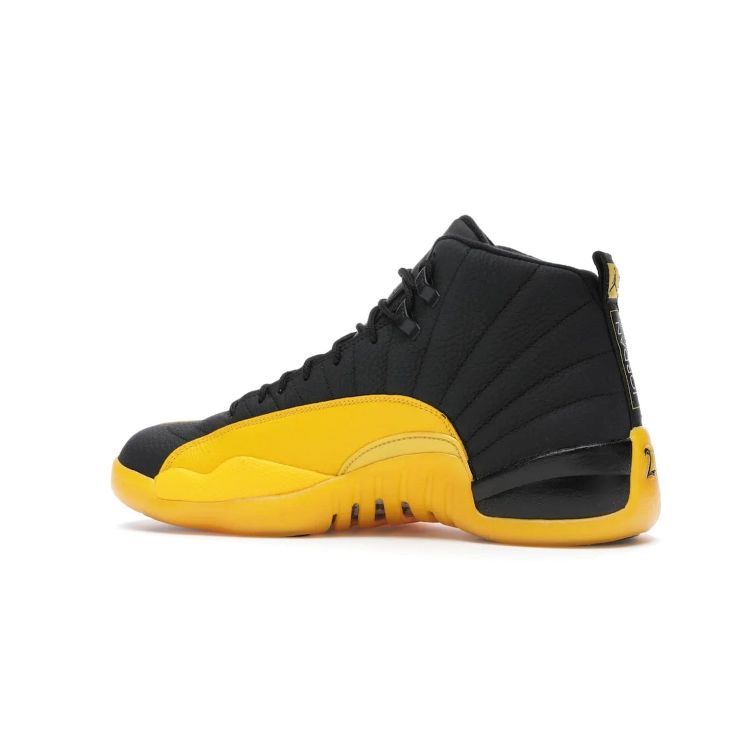 Jordan 12 Retro Black University Gold - Image 21 - Only at www.BallersClubKickz.com - This Jordan 12 Retro features a black tumbled leather upper and University Gold accents for a modern twist. Boasting Jordan "Two Three" branding and a yellow sole, these shoes will elevate your wardrobe. Fresh, sleek, and one of a kind - the Jordan 12 University Gold is your summer sneaker.