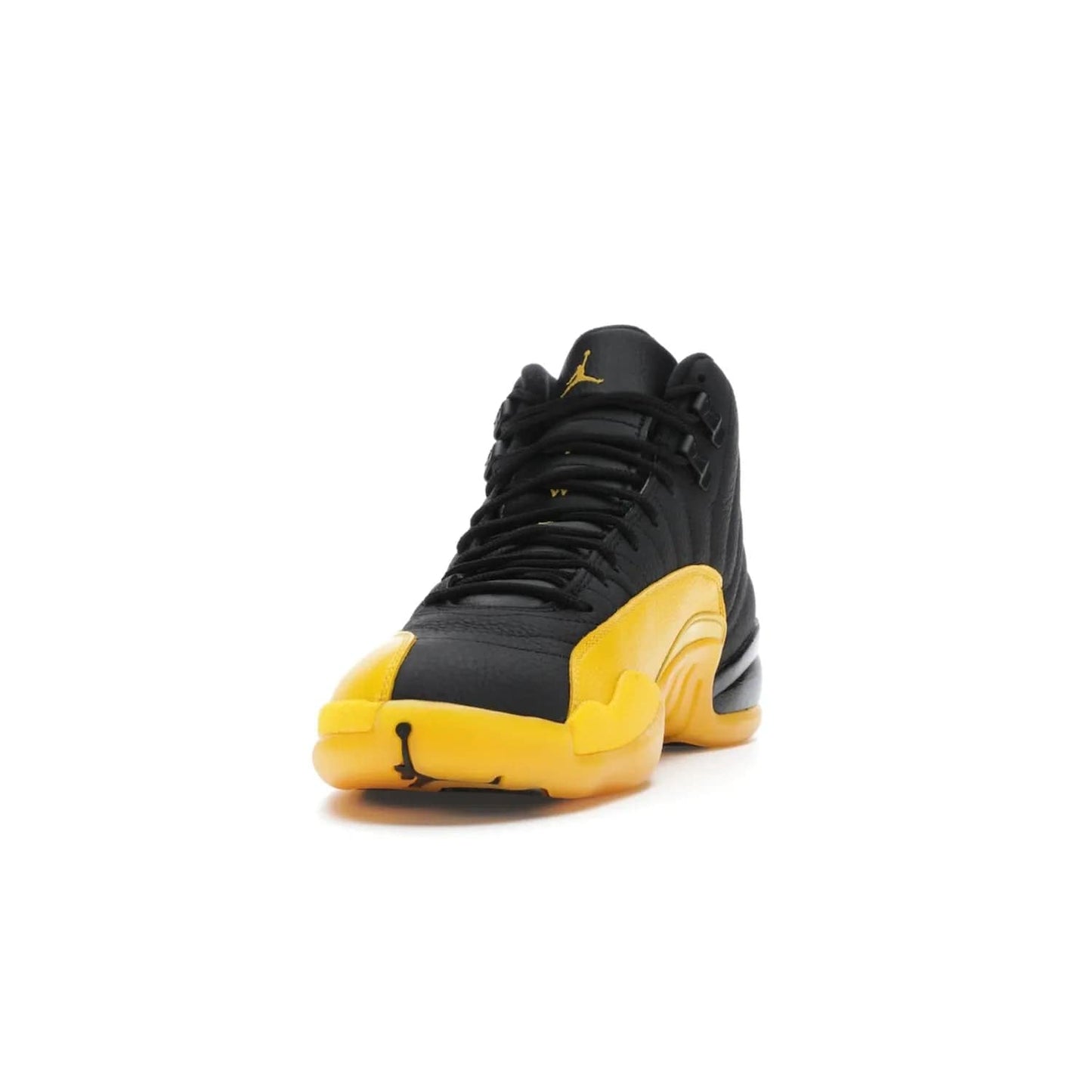 Jordan 12 Retro Black University Gold - Image 12 - Only at www.BallersClubKickz.com - This Jordan 12 Retro features a black tumbled leather upper and University Gold accents for a modern twist. Boasting Jordan "Two Three" branding and a yellow sole, these shoes will elevate your wardrobe. Fresh, sleek, and one of a kind - the Jordan 12 University Gold is your summer sneaker.