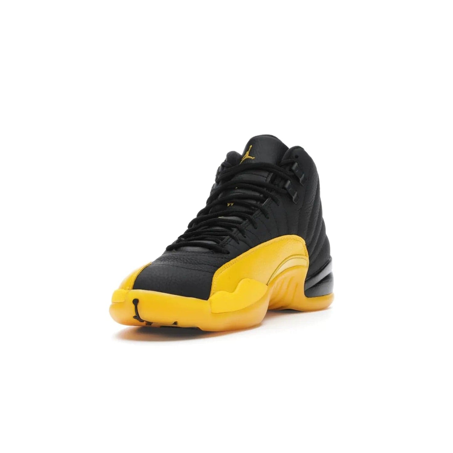 Jordan 12 Retro Black University Gold - Image 13 - Only at www.BallersClubKickz.com - This Jordan 12 Retro features a black tumbled leather upper and University Gold accents for a modern twist. Boasting Jordan "Two Three" branding and a yellow sole, these shoes will elevate your wardrobe. Fresh, sleek, and one of a kind - the Jordan 12 University Gold is your summer sneaker.