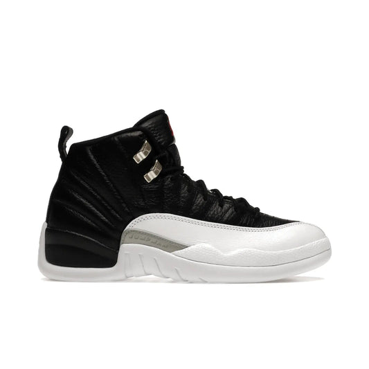 Jordan 12 Retro Playoffs (2022) - Image 1 - Only at www.BallersClubKickz.com - Retro Air Jordan 12 Playoffs. Celebrate 25 years with MJ's iconic shoe. Black tumbled leather upper, white sole with carbon fiber detailing and Jumpman embroidery. Must-have for any Jordan shoe fan. Releases March 2022.
