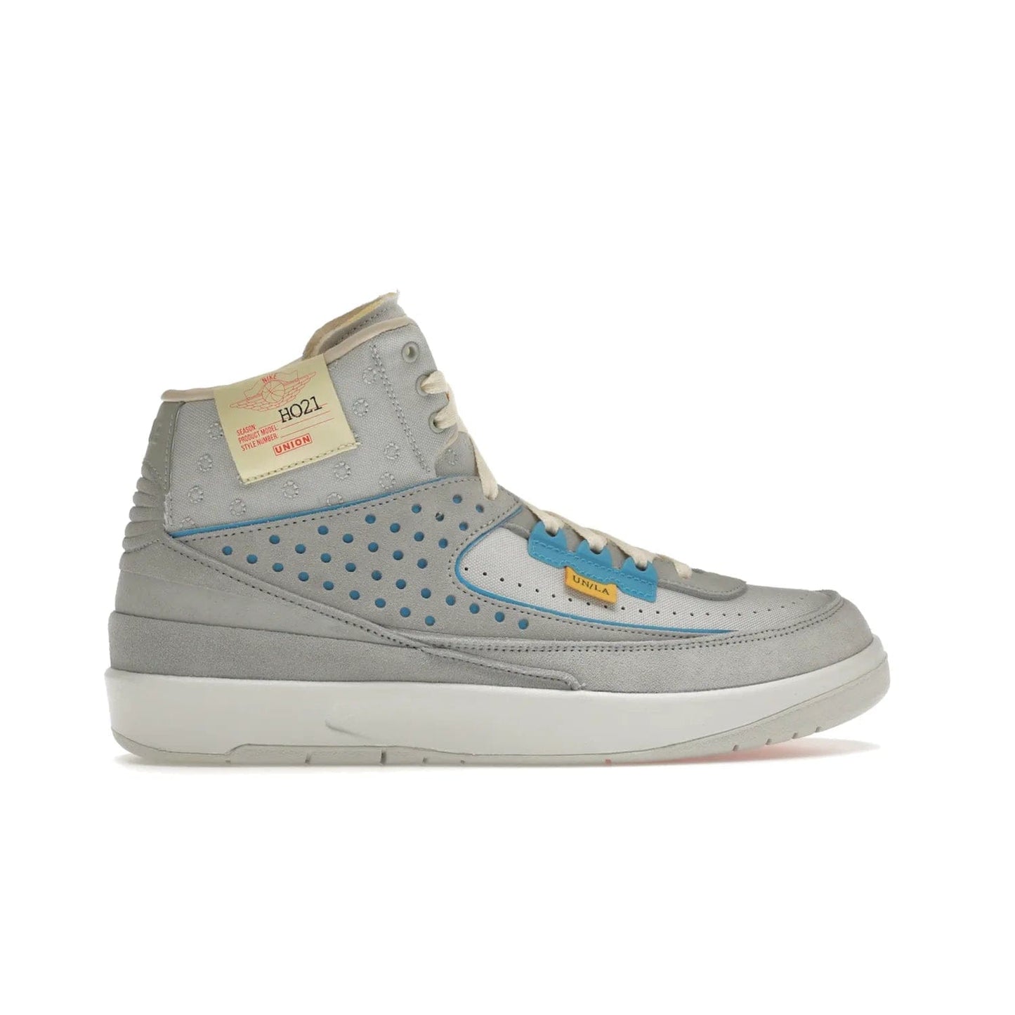 Jordan 2 Retro SP Union Grey Fog - Image 36 - Only at www.BallersClubKickz.com - Introducing the Air Jordan 2 Retro SP Union Grey Fog. This intricate sneaker design features a grey canvas upper with light blue eyelets, eyestay patches, and piping, plus custom external tags. Dropping in April 2022, this exclusive release offers a worn-in look and feel.