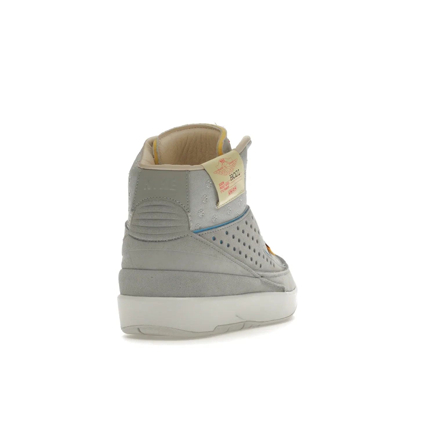 Jordan 2 Retro SP Union Grey Fog - Image 30 - Only at www.BallersClubKickz.com - Introducing the Air Jordan 2 Retro SP Union Grey Fog. This intricate sneaker design features a grey canvas upper with light blue eyelets, eyestay patches, and piping, plus custom external tags. Dropping in April 2022, this exclusive release offers a worn-in look and feel.