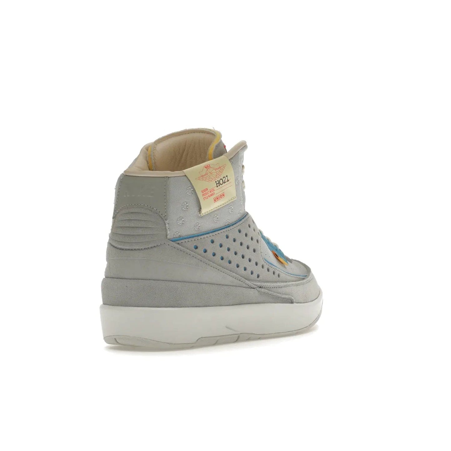Jordan 2 Retro SP Union Grey Fog - Image 31 - Only at www.BallersClubKickz.com - Introducing the Air Jordan 2 Retro SP Union Grey Fog. This intricate sneaker design features a grey canvas upper with light blue eyelets, eyestay patches, and piping, plus custom external tags. Dropping in April 2022, this exclusive release offers a worn-in look and feel.