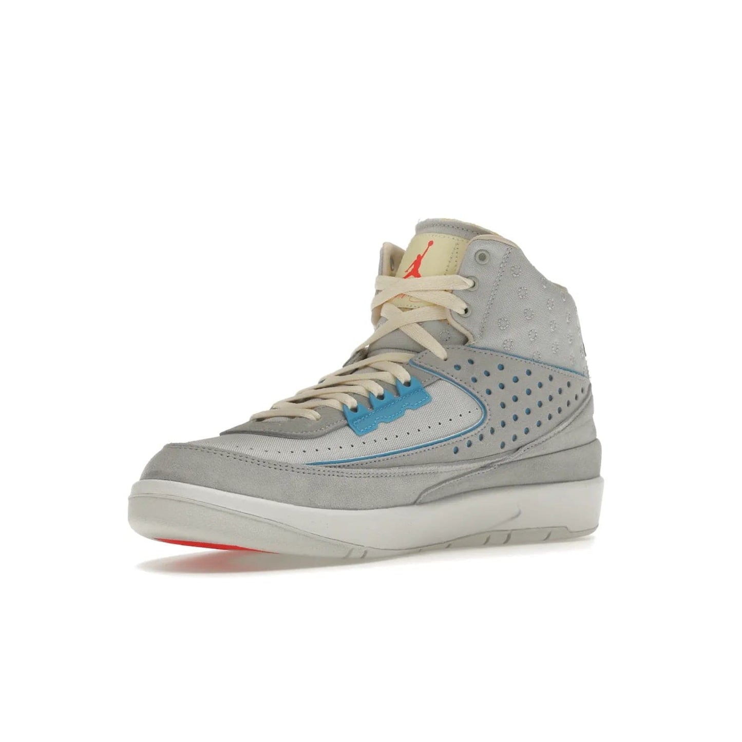 Jordan 2 Retro SP Union Grey Fog - Image 15 - Only at www.BallersClubKickz.com - Introducing the Air Jordan 2 Retro SP Union Grey Fog. This intricate sneaker design features a grey canvas upper with light blue eyelets, eyestay patches, and piping, plus custom external tags. Dropping in April 2022, this exclusive release offers a worn-in look and feel.