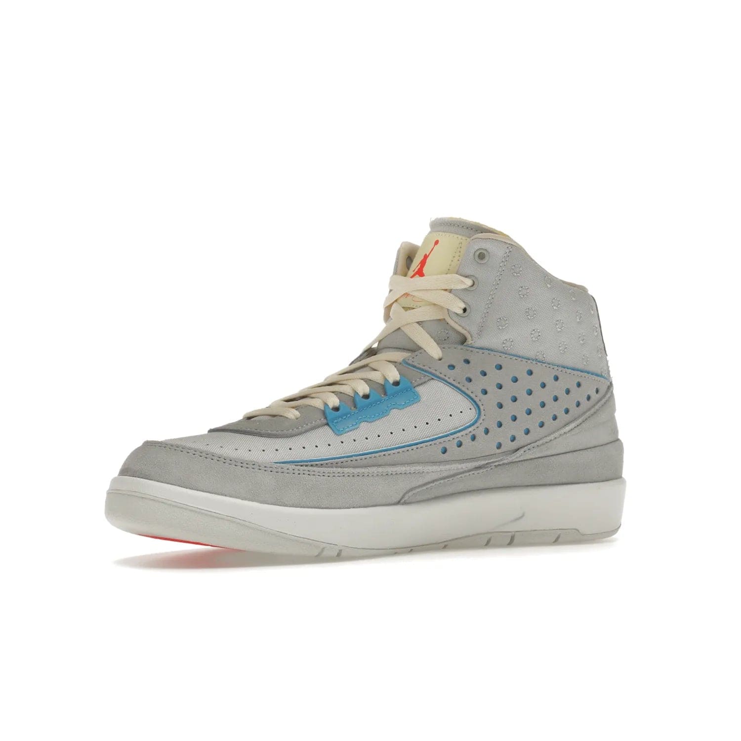 Jordan 2 Retro SP Union Grey Fog - Image 16 - Only at www.BallersClubKickz.com - Introducing the Air Jordan 2 Retro SP Union Grey Fog. This intricate sneaker design features a grey canvas upper with light blue eyelets, eyestay patches, and piping, plus custom external tags. Dropping in April 2022, this exclusive release offers a worn-in look and feel.