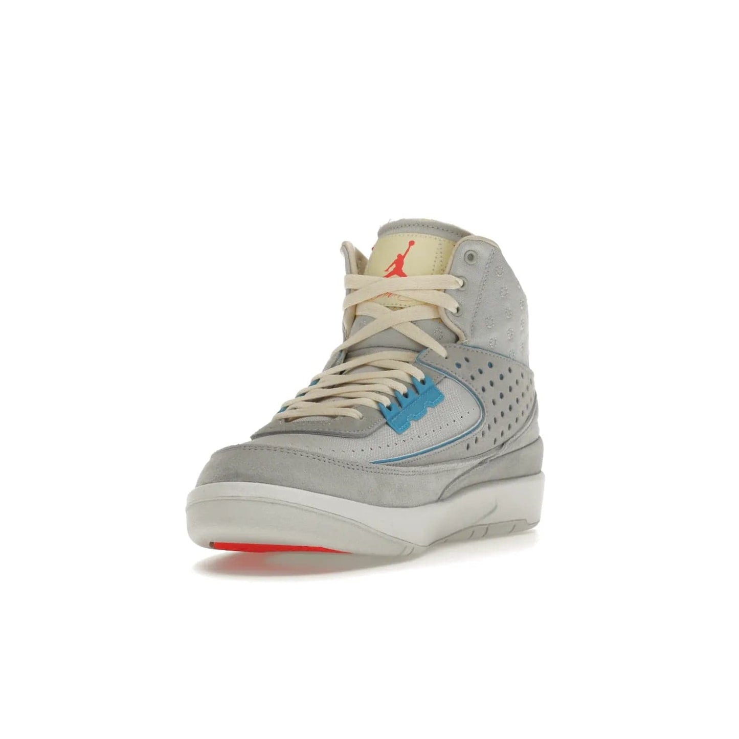 Jordan 2 Retro SP Union Grey Fog - Image 13 - Only at www.BallersClubKickz.com - Introducing the Air Jordan 2 Retro SP Union Grey Fog. This intricate sneaker design features a grey canvas upper with light blue eyelets, eyestay patches, and piping, plus custom external tags. Dropping in April 2022, this exclusive release offers a worn-in look and feel.
