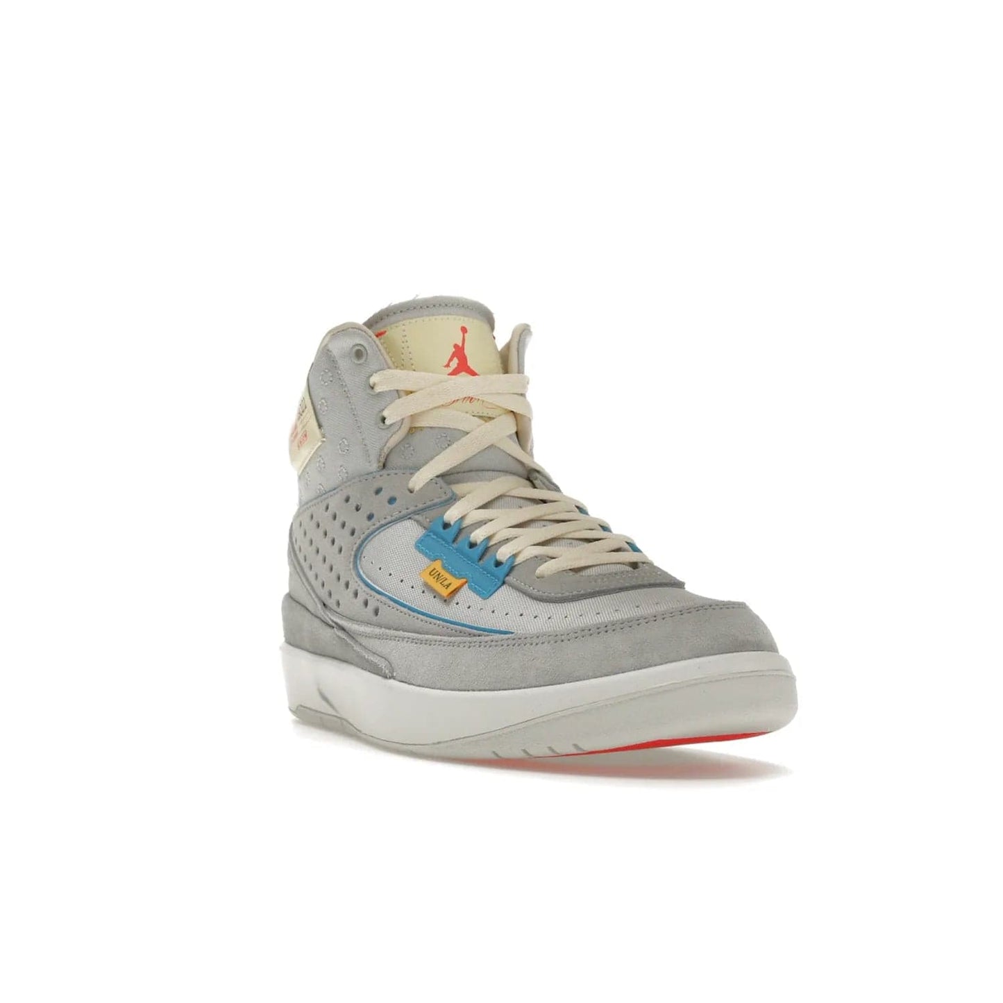 Jordan 2 Retro SP Union Grey Fog - Image 7 - Only at www.BallersClubKickz.com - Introducing the Air Jordan 2 Retro SP Union Grey Fog. This intricate sneaker design features a grey canvas upper with light blue eyelets, eyestay patches, and piping, plus custom external tags. Dropping in April 2022, this exclusive release offers a worn-in look and feel.