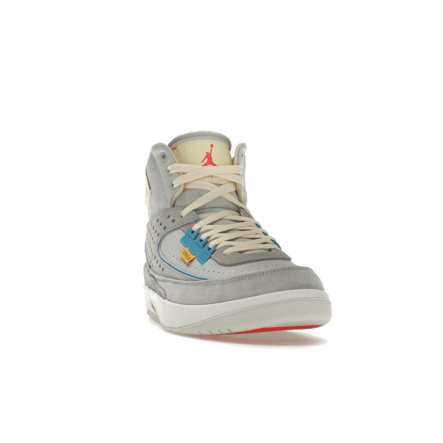 Jordan 2 Retro SP Union Grey Fog - Image 8 - Only at www.BallersClubKickz.com - Introducing the Air Jordan 2 Retro SP Union Grey Fog. This intricate sneaker design features a grey canvas upper with light blue eyelets, eyestay patches, and piping, plus custom external tags. Dropping in April 2022, this exclusive release offers a worn-in look and feel.