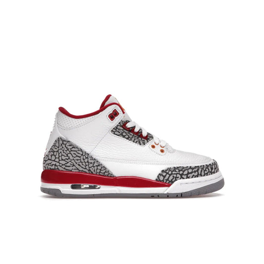 Jordan 3 Retro Cardinal (GS) - Image 1 - Only at www.BallersClubKickz.com - Shop the kid-sized Air Jordan 3 Retro Cardinal GS, released Feb 2022. White tumbled leather upper, light curry accenting, cement grey and classic red details throughout. Visible Air cushioning, midsole, and an eye-catching outsole. Show off your style with this fashionable streetwear silhouette.