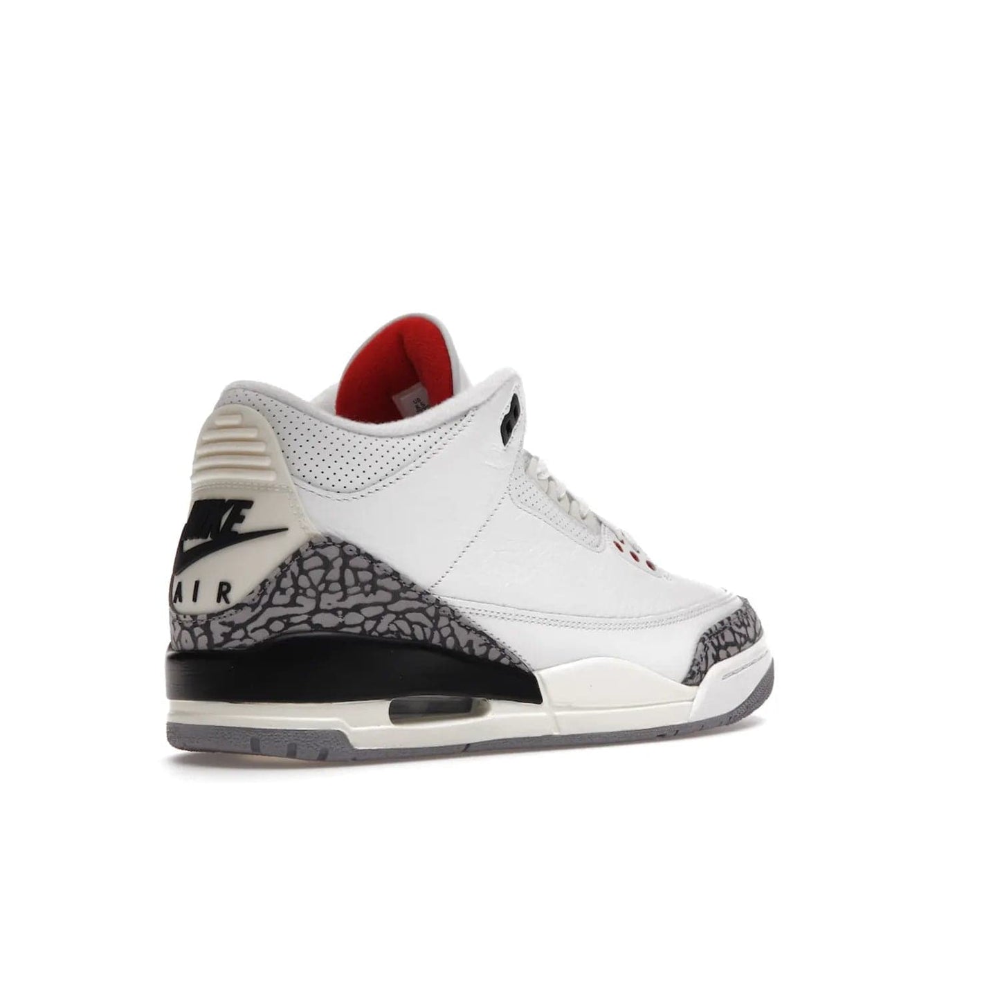 Jordan 3 Retro White Cement Reimagined - Image 33 - Only at www.BallersClubKickz.com - The Reimagined Air Jordan 3 Retro in a Summit White/Fire Red/Black/Cement Grey colorway is launching on March 11, 2023. Featuring a white leather upper, off-white midsoles and heel tabs, this vintage-look sneaker is a must-have.