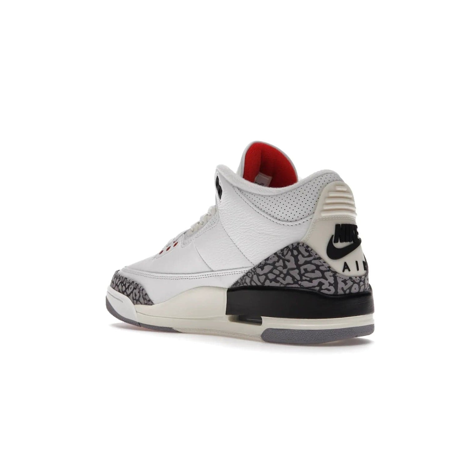 Jordan 3 Retro White Cement Reimagined - Image 24 - Only at www.BallersClubKickz.com - The Reimagined Air Jordan 3 Retro in a Summit White/Fire Red/Black/Cement Grey colorway is launching on March 11, 2023. Featuring a white leather upper, off-white midsoles and heel tabs, this vintage-look sneaker is a must-have.