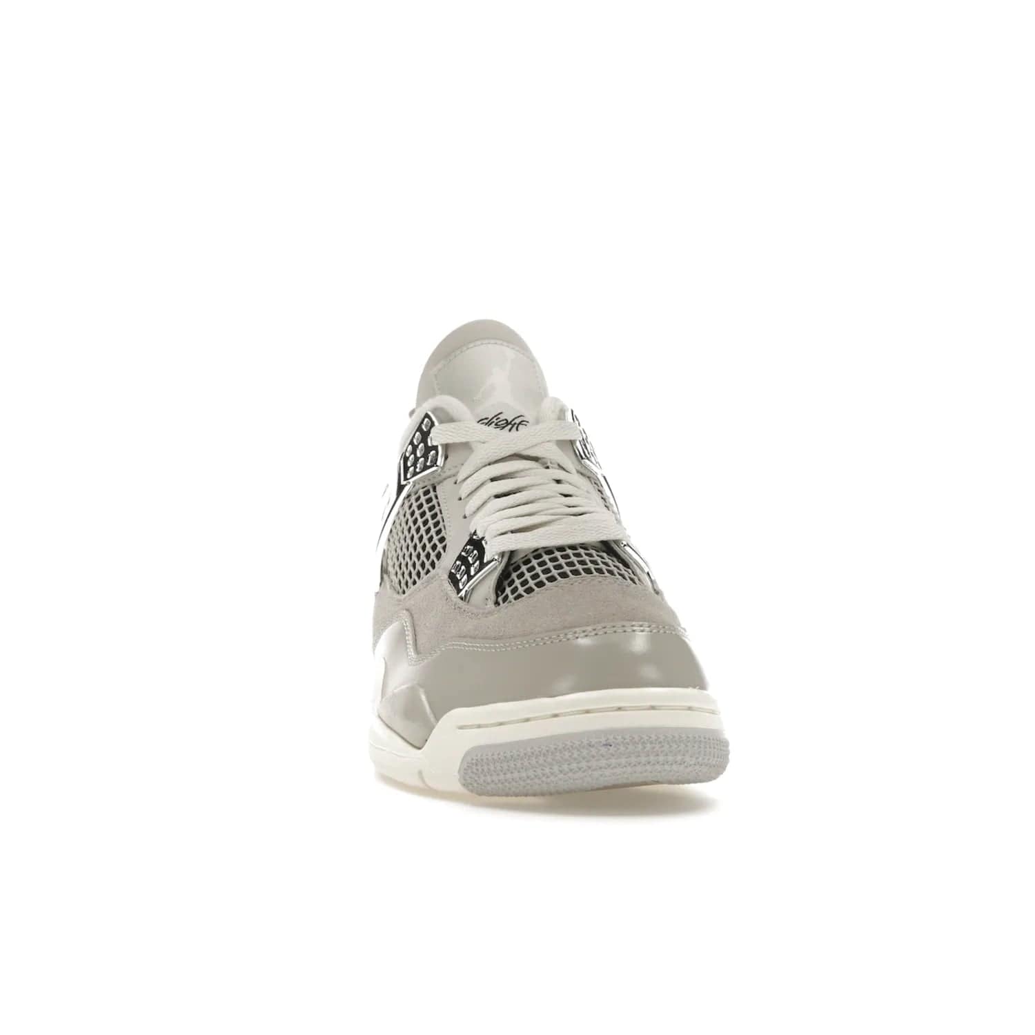 Jordan 4 Retro Frozen Moments (Women's) - Image 9 - Only at www.BallersClubKickz.com - The Jordan 4 Retro Frozen Moments is a stylish blend of classic design elements and modern tones. Featuring suede and leather overlays in a light iron-ore, sail, neutral grey, black, and metallic silver colorway. Get this iconic high-performance sneaker for $210.