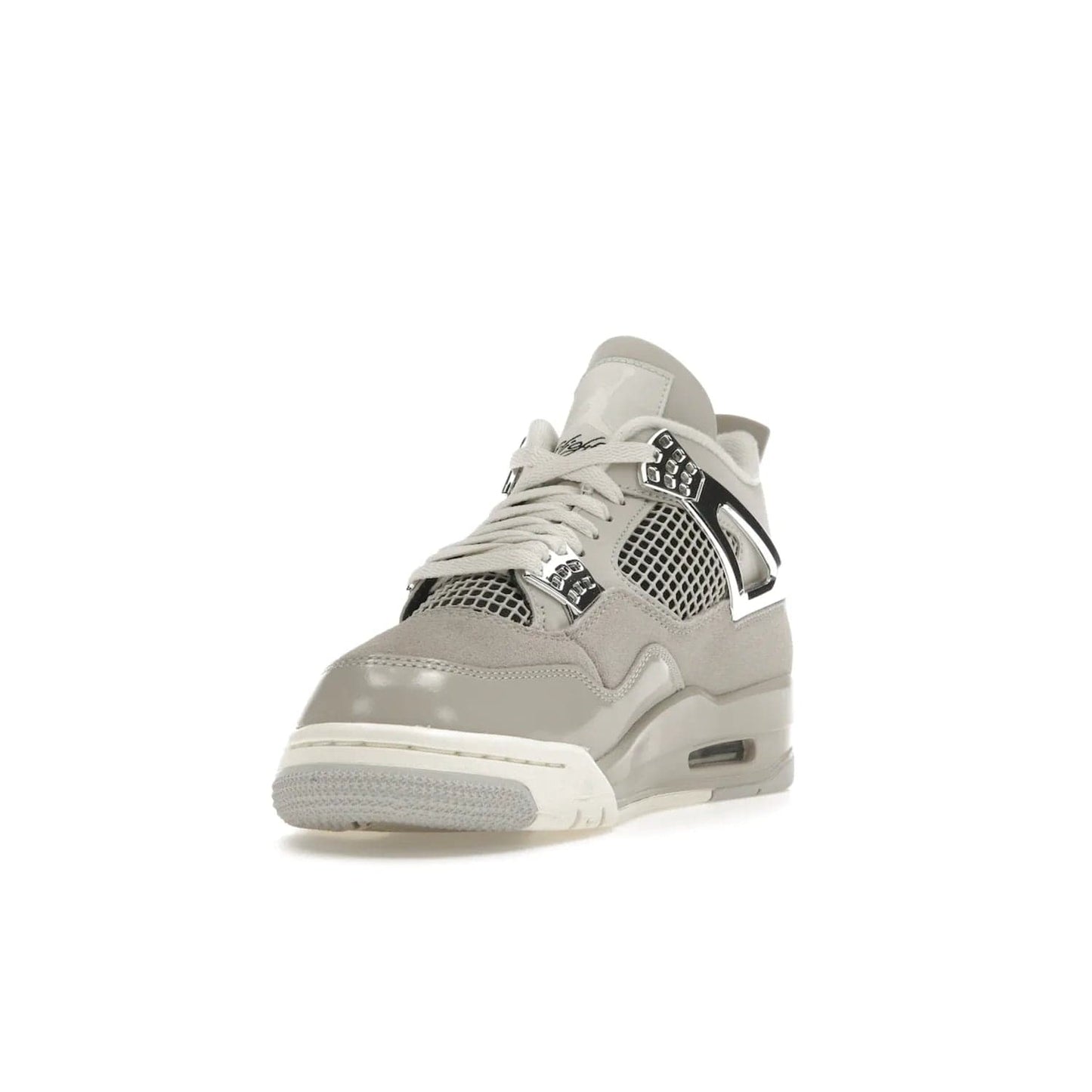 Jordan 4 Retro Frozen Moments (Women's) - Image 13 - Only at www.BallersClubKickz.com - The Jordan 4 Retro Frozen Moments is a stylish blend of classic design elements and modern tones. Featuring suede and leather overlays in a light iron-ore, sail, neutral grey, black, and metallic silver colorway. Get this iconic high-performance sneaker for $210.