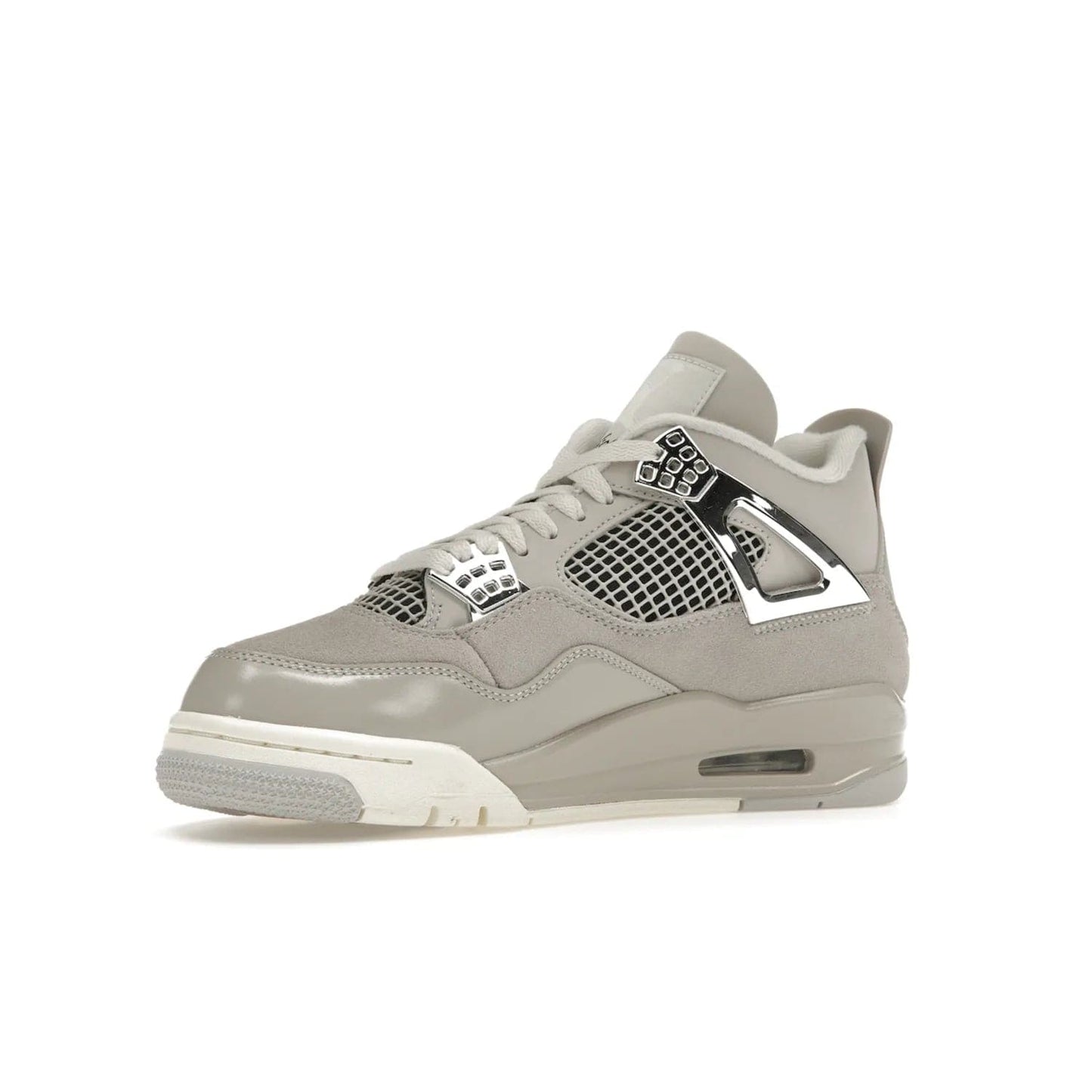 Jordan 4 Retro Frozen Moments (Women's) - Image 16 - Only at www.BallersClubKickz.com - The Jordan 4 Retro Frozen Moments is a stylish blend of classic design elements and modern tones. Featuring suede and leather overlays in a light iron-ore, sail, neutral grey, black, and metallic silver colorway. Get this iconic high-performance sneaker for $210.