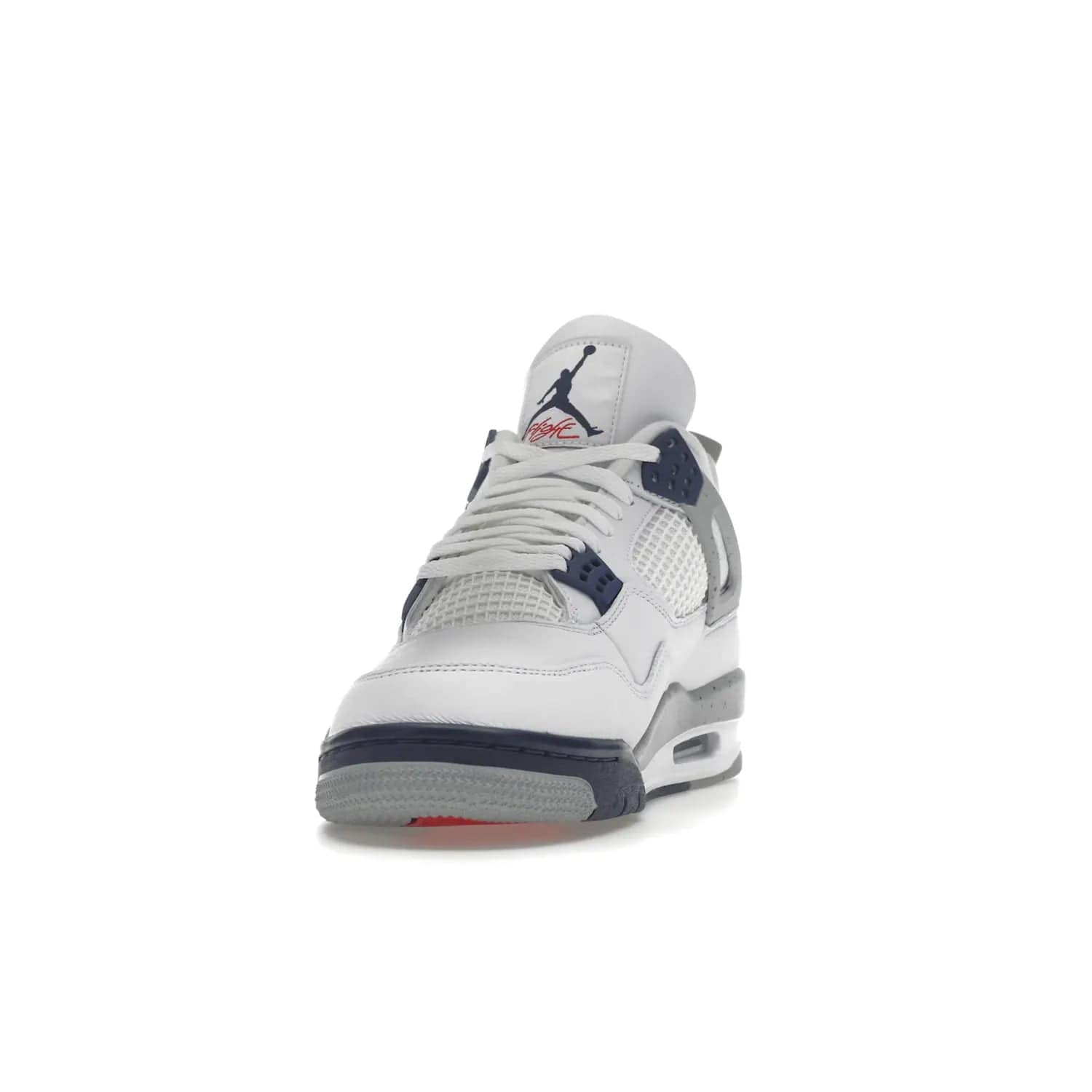 Jordan 4 Retro Midnight Navy - Image 12 - Only at www.BallersClubKickz.com - Shop the Air Jordan Retro 4 White Midnight Navy. Stand out with a classic white leather upper, black support wings, midnight navy eyelets, and Crimson Jumpman tongue tag. Unbeatable comfort with two-tone polyurethane midsole with encapsulated Air technology. Get yours before October 29th, 2022.