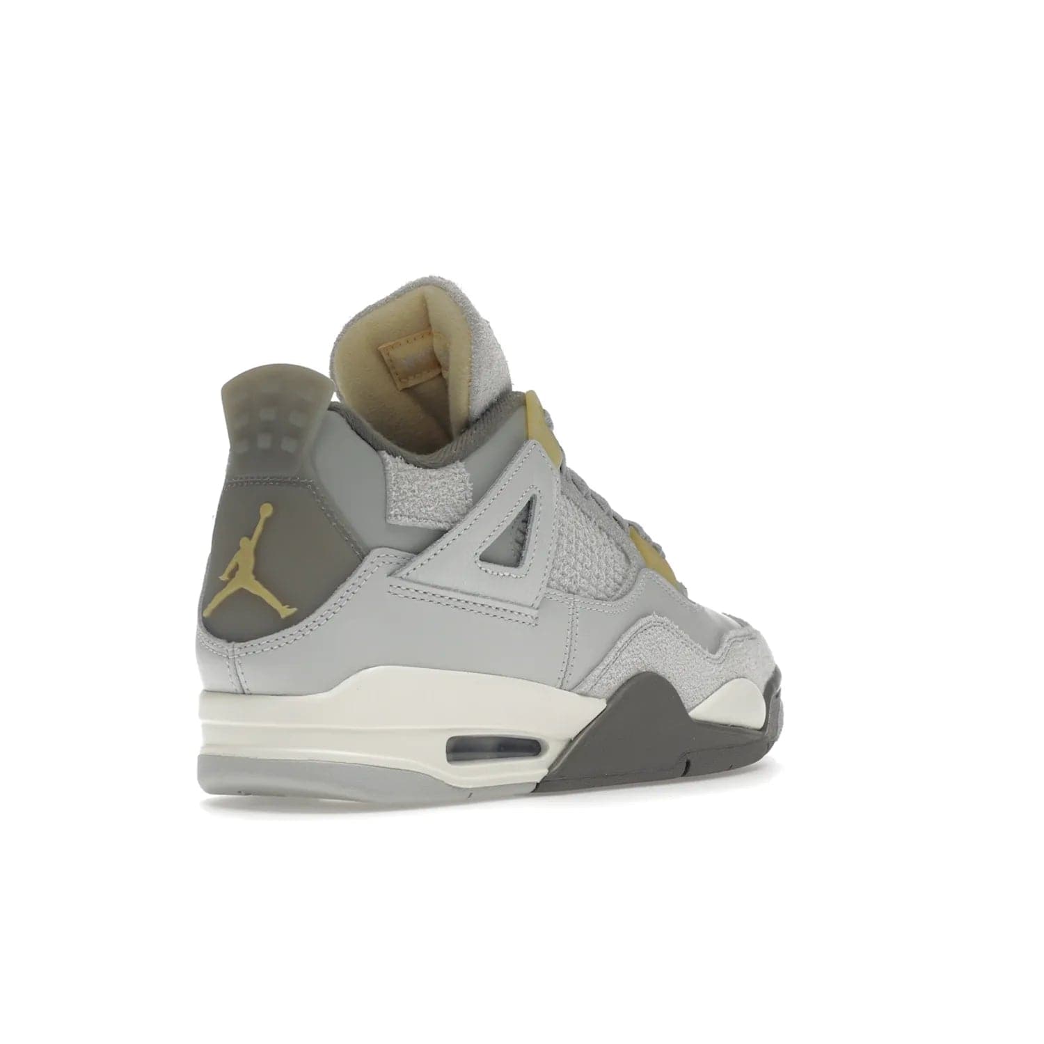 Jordan 4 Retro SE Craft Photon Dust - Image 32 - Only at www.BallersClubKickz.com - Upgrade your shoe collection with the Air Jordan 4 Retro SE Craft Photon Dust. This luxurious sneaker features a combination of suede and leather with unique grey tones like Photon Dust, Pale Vanilla, Off White, Grey Fog, Flat Pewter, and Sail. Available February 11, 2023.
