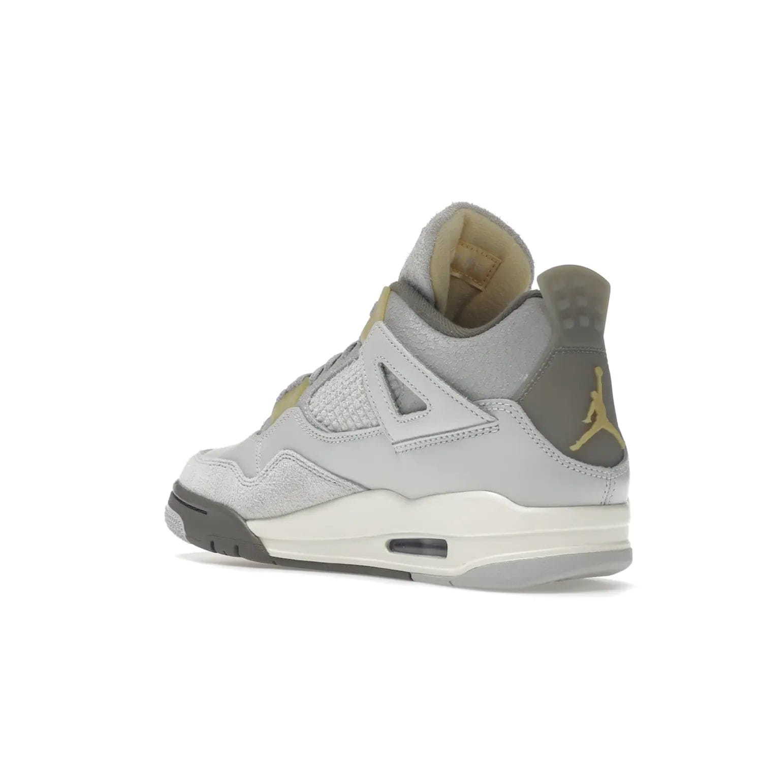 Jordan 4 Retro SE Craft Photon Dust - Image 24 - Only at www.BallersClubKickz.com - Upgrade your shoe collection with the Air Jordan 4 Retro SE Craft Photon Dust. This luxurious sneaker features a combination of suede and leather with unique grey tones like Photon Dust, Pale Vanilla, Off White, Grey Fog, Flat Pewter, and Sail. Available February 11, 2023.