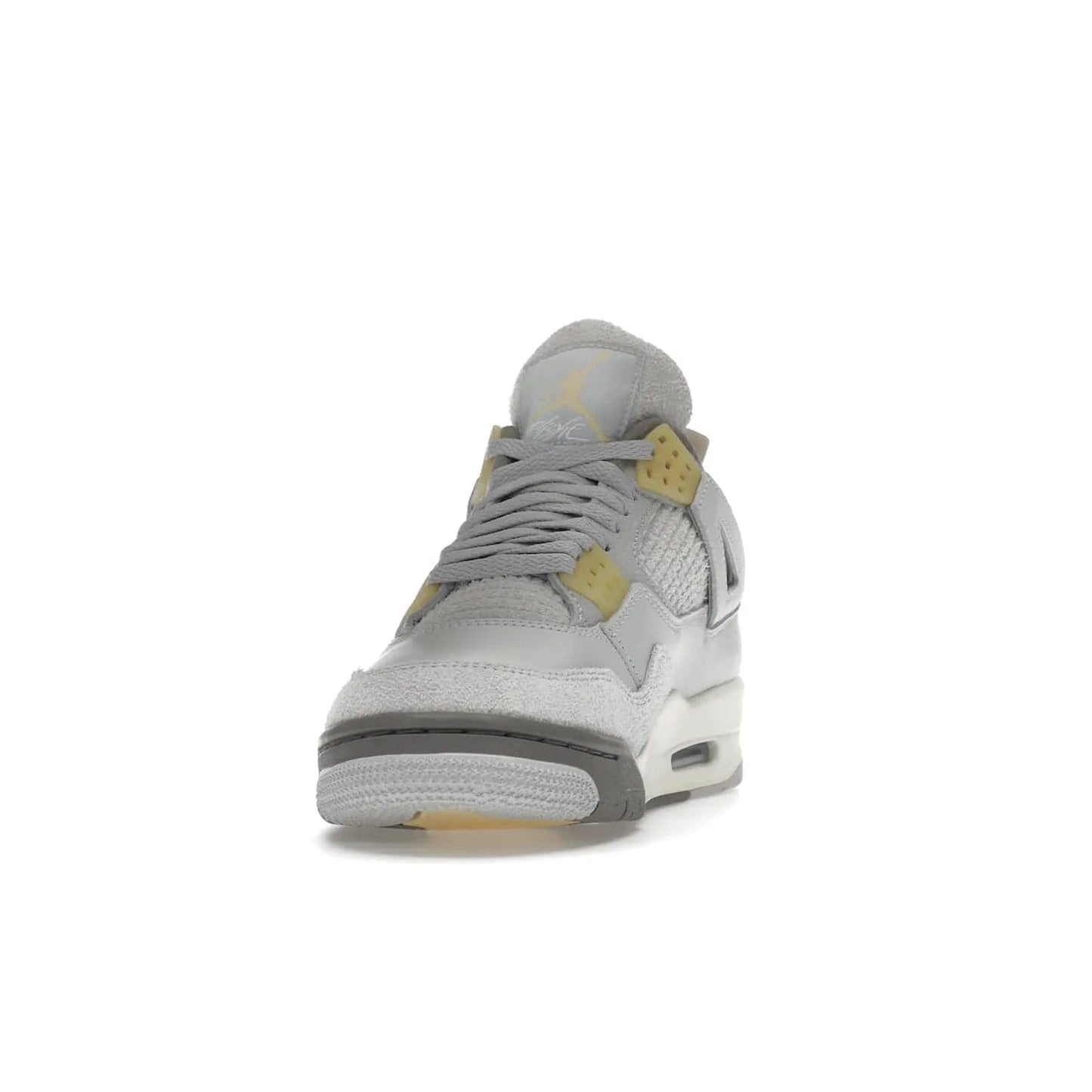 Jordan 4 Retro SE Craft Photon Dust - Image 12 - Only at www.BallersClubKickz.com - Upgrade your shoe collection with the Air Jordan 4 Retro SE Craft Photon Dust. This luxurious sneaker features a combination of suede and leather with unique grey tones like Photon Dust, Pale Vanilla, Off White, Grey Fog, Flat Pewter, and Sail. Available February 11, 2023.
