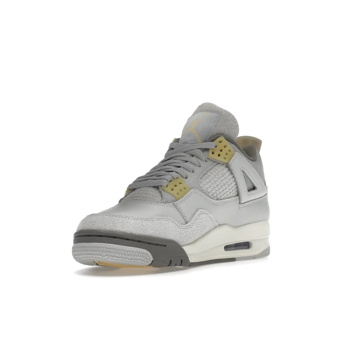 Jordan 4 Retro SE Craft Photon Dust - Image 14 - Only at www.BallersClubKickz.com - Upgrade your shoe collection with the Air Jordan 4 Retro SE Craft Photon Dust. This luxurious sneaker features a combination of suede and leather with unique grey tones like Photon Dust, Pale Vanilla, Off White, Grey Fog, Flat Pewter, and Sail. Available February 11, 2023.