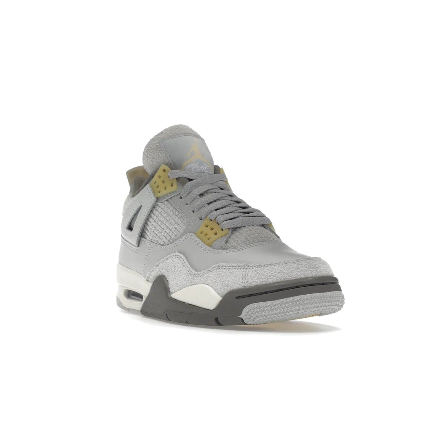Jordan 4 Retro SE Craft Photon Dust - Image 7 - Only at www.BallersClubKickz.com - Upgrade your shoe collection with the Air Jordan 4 Retro SE Craft Photon Dust. This luxurious sneaker features a combination of suede and leather with unique grey tones like Photon Dust, Pale Vanilla, Off White, Grey Fog, Flat Pewter, and Sail. Available February 11, 2023.