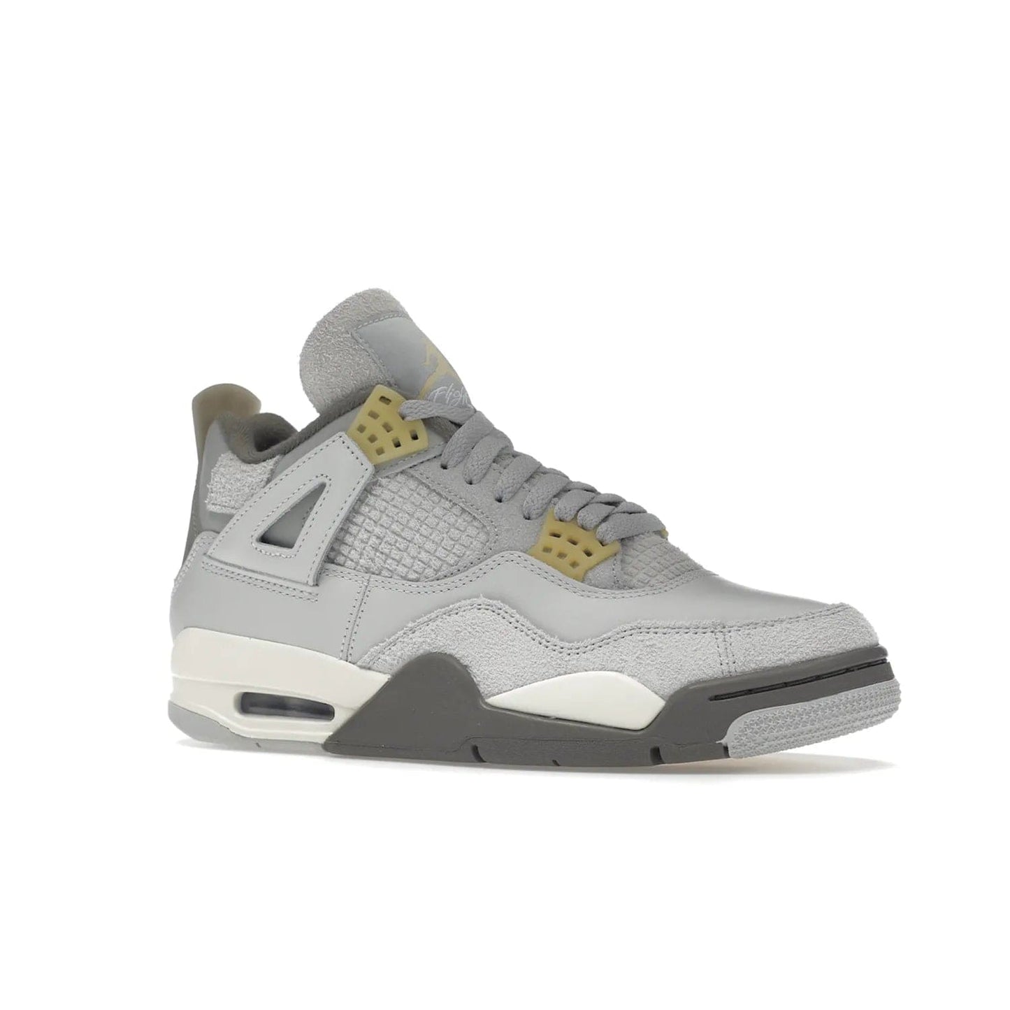 Jordan 4 Retro SE Craft Photon Dust - Image 4 - Only at www.BallersClubKickz.com - Upgrade your shoe collection with the Air Jordan 4 Retro SE Craft Photon Dust. This luxurious sneaker features a combination of suede and leather with unique grey tones like Photon Dust, Pale Vanilla, Off White, Grey Fog, Flat Pewter, and Sail. Available February 11, 2023.